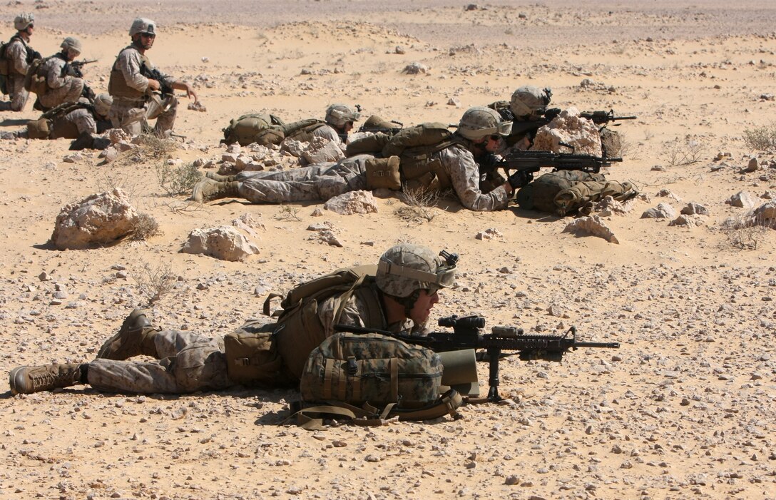 Lance Cpl. Henry J. Aranda, a rifleman with Lima Company, Battalion Landing Team, 3rd Battalion, 2nd Marine Regiment, 22nd Marine Expeditionary Unit and native of San Gabriel, Calif., sets up security with his squad after dismounting an MV-22B Osprey with Marine Medium Tiltrotor Squadron 263 (Reinforced), 22nd MEU, during Exercise Bright Star 2009 in Egypt, Oct. 12, 2009. The multinational exercise is designed to improve readiness, interoperability, and strengthen the military and professional relationships among U.S., Egyptian and participating forces. Bright Star is conducted by U.S. Central Command and held every two years. Elements of the 22nd MEU are currently are participating in the multi-national exercise while serving as the theater reserve force for U.S. Central Command.::r::::n::(Official Marine Corps Photo by Cpl. Justin M. Martinez)::r::::n::