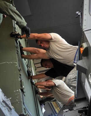 HICKAM AIR FORCE BASE, Hawaii -- Airmen assigned to the 15th Airlift Wing load cargo and supplies on a C-17 Globemaster III prior to departure Oct. 13 for bilateral exercise Cope India.The U.S. and Indian air forces will train together Oct. 15-24 at Air Force Station Agra in Uttar Predesh, India. More than 150 U.S. Airmen will participate. This exercise continues to strengthen the bond between the U.S. and Indian air forces, and will be the fourth installment of Cope India. (U.S. Air Force photo/Staff Sgt. Carolyn Viss)