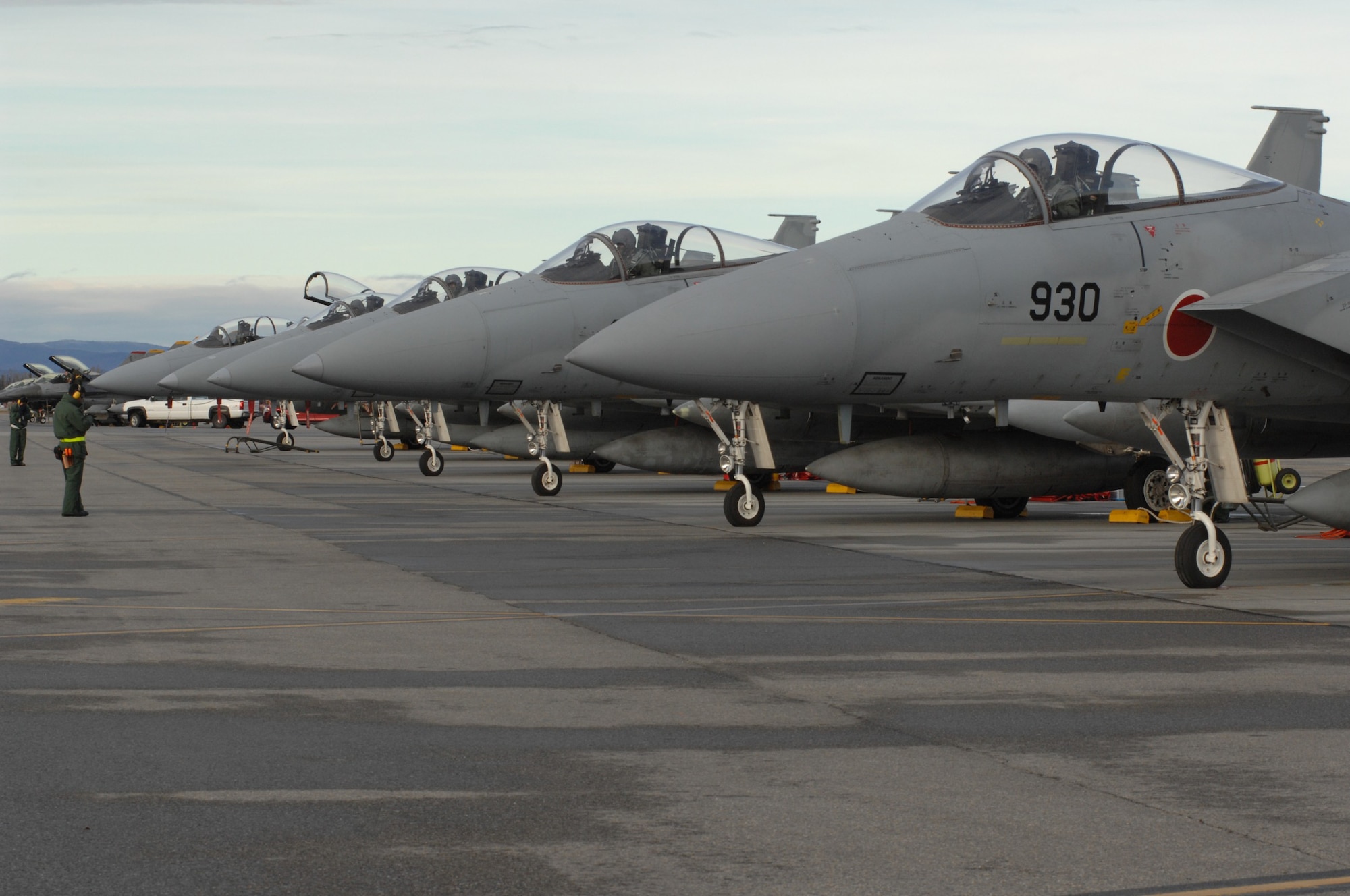 Several F-15 Eagle's from the Japan Air Self-Defense Force prepare to take to the sky during RED FLAG-Alaska 10-1, Oct. 8, 2009, Eielson Air Force Base, Alaska. RF-A provides participants 67,000 square miles of airspace, more than 30 threat simulators, one conventional bombing range and two tactical bombing ranges containing more than 400 different types of targets. (U.S. Air Force photo/Airman 1st Class Rachelle Coleman)