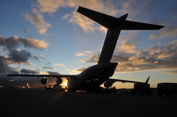 HICKAM AIR FORCE BASE, Hawaii -- A C-17 Globemaster III assigned to the 15th Airlift Wing's 535th Airlift Squadron is loaded on the flightline here prior to departure Oct. 13 for bilateral exercise Cope India.The U.S. and Indian air forces will train together Oct. 15-24 at Air Force Station Agra in Uttar Predesh, India. More than 150 U.S. Airmen will participate. This exercise continues to strengthen the bond between the U.S. and Indian air forces, and will be the fourth installment of Cope India. (U.S. Air Force photo/Staff Sgt. Carolyn Viss)