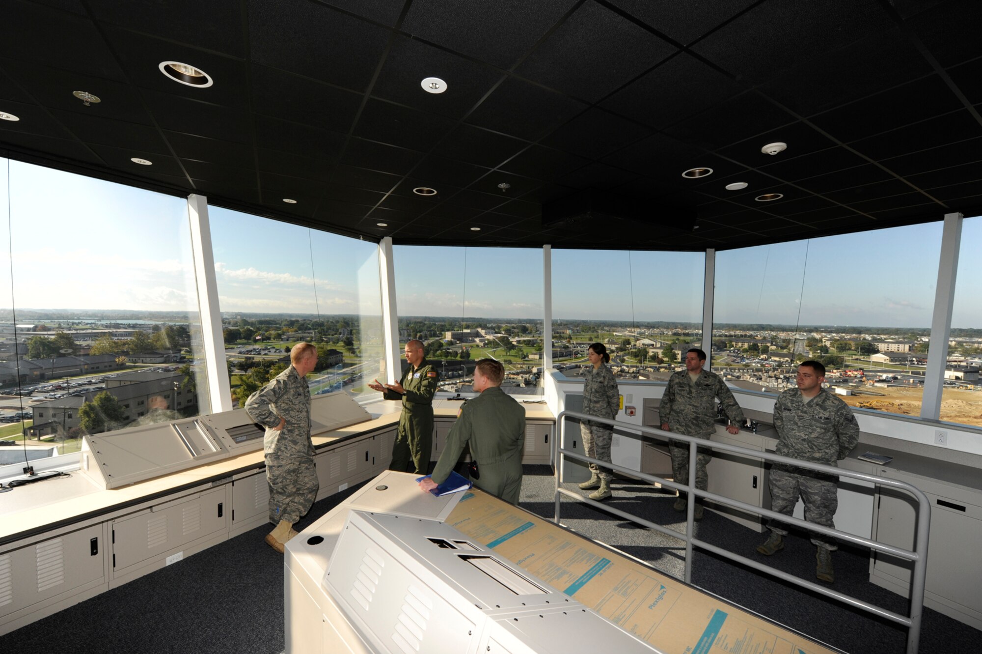 (Left) Col. Steven Jordan, Air Mobility Command Installation Excellence Selection Board team member, listens as Col. David Horton, 436th Operations Group commander, highlights some of the features of the new Air Traffic Control facility at Dover Air Force Base Oct. 7. Dover AFB is competing against Little Rock AFB, Ark., and Charleston AFB, S.C., at the AMC-level of the Commander in Chief’s Annual Award for Installation Excellence for $100,000 in quality of life funding and a chance to compete at the Air Force level. (U.S. Air Force photo by Jason Minto)