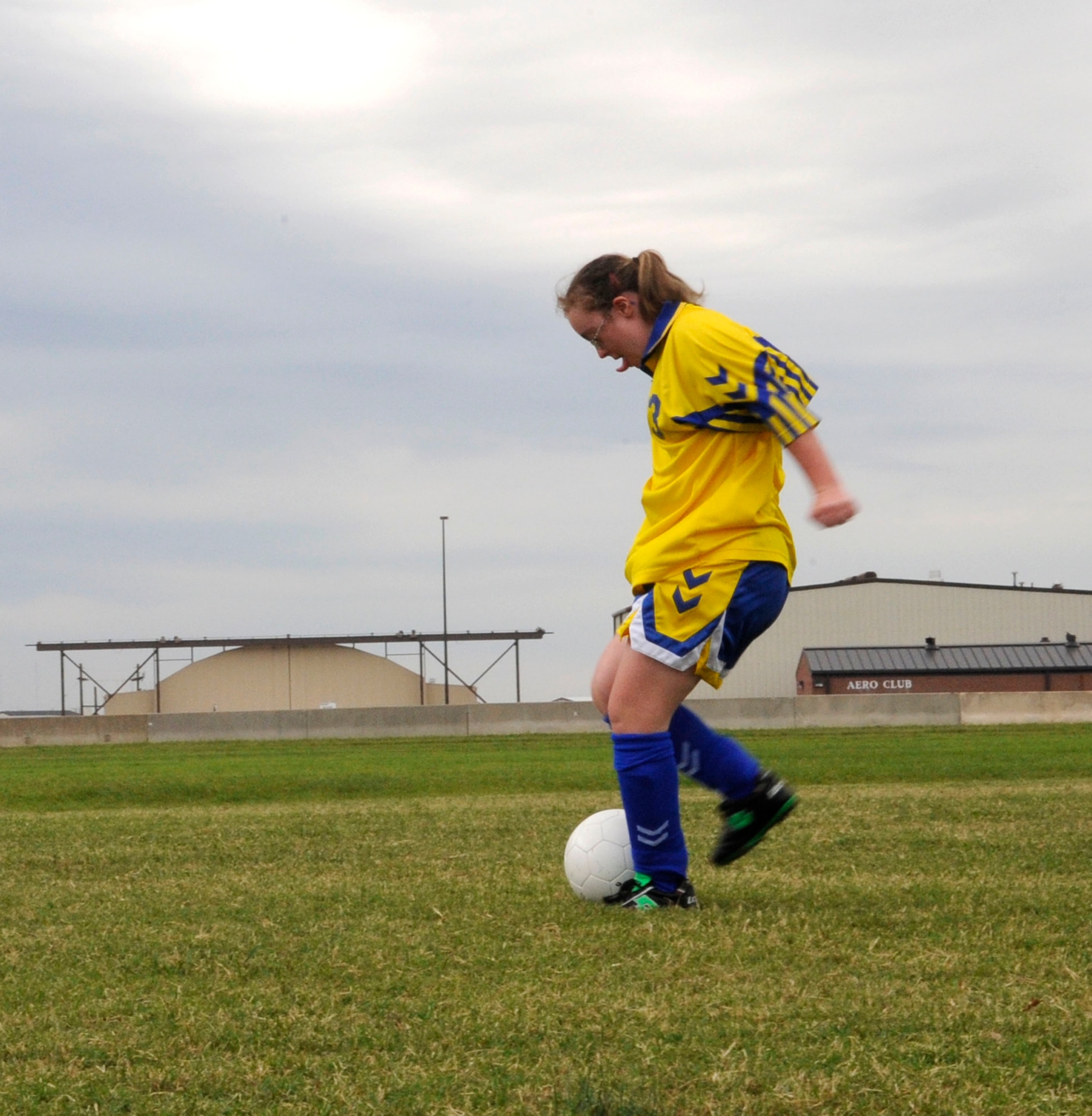 LANGLEY AIR FORCE BASE, Va. - Katie Blind, member of the Virginia Beach Waves, races down the field to score during the Special Olympics soccer game here Oct. 10. Approximately 200 athletes put their talents on display during this annual event by participating in the special skill challenges offered by Col. Matt Molloy, 1st Fighter Wing commander and many Langley volunteers. (U.S. Air Force photo/Senior Airman Dana Hill)