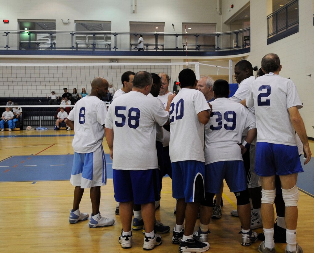 LANGLEY AIR FORCE BASE, Va. - The Virginia Beach Nighthawks rally together to do a cheer after their game during the Special Olympics held here Oct. 10.   Approximately 200 athletes put their talents on display during this annual event by participating in the special skill challenges offered by Col. Matt Molloy, 1st Fighter Wing commander and many Langley volunteers. (U.S. Air Force photo/Senior Airman Dana Hill)
