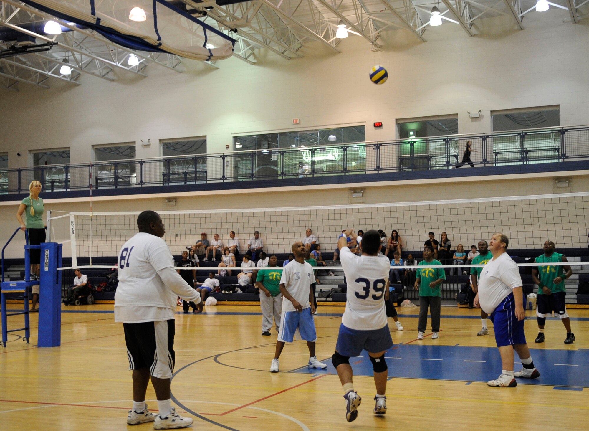 LANGLEY AIR FORCE BASE, Va. -- Members of the Virginia Beach Nighthawks and Eastern Shore Express, battle it out in an intense volleyball game during the Special Olympics here Oct. 10.   Approximately 200 athletes put their talents on display during this annual event by participating in the special skill challenges offered by Col. Matt Molloy, 1st Fighter Wing commander and many Langley volunteers. (U.S. Air Force photo/Senior Airman Dana Hill)