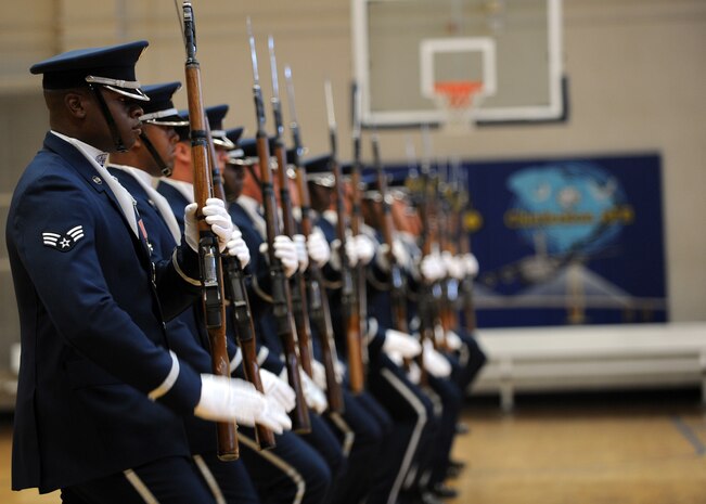 The Air Force Honor Guard Drill Team performs at the Fitness and Sports Center here Oct. 9. Drill Team members are selected from the current U.S. Air Force Honor Guard personnel. The Drill Team members represent the best of each of the individual ceremonial flights and are all members who have risen to the challenge and developed the discipline required to be a member of this elite perforce unit. (U.S. Air Force photo/Senior Airman Katie Gieratz)