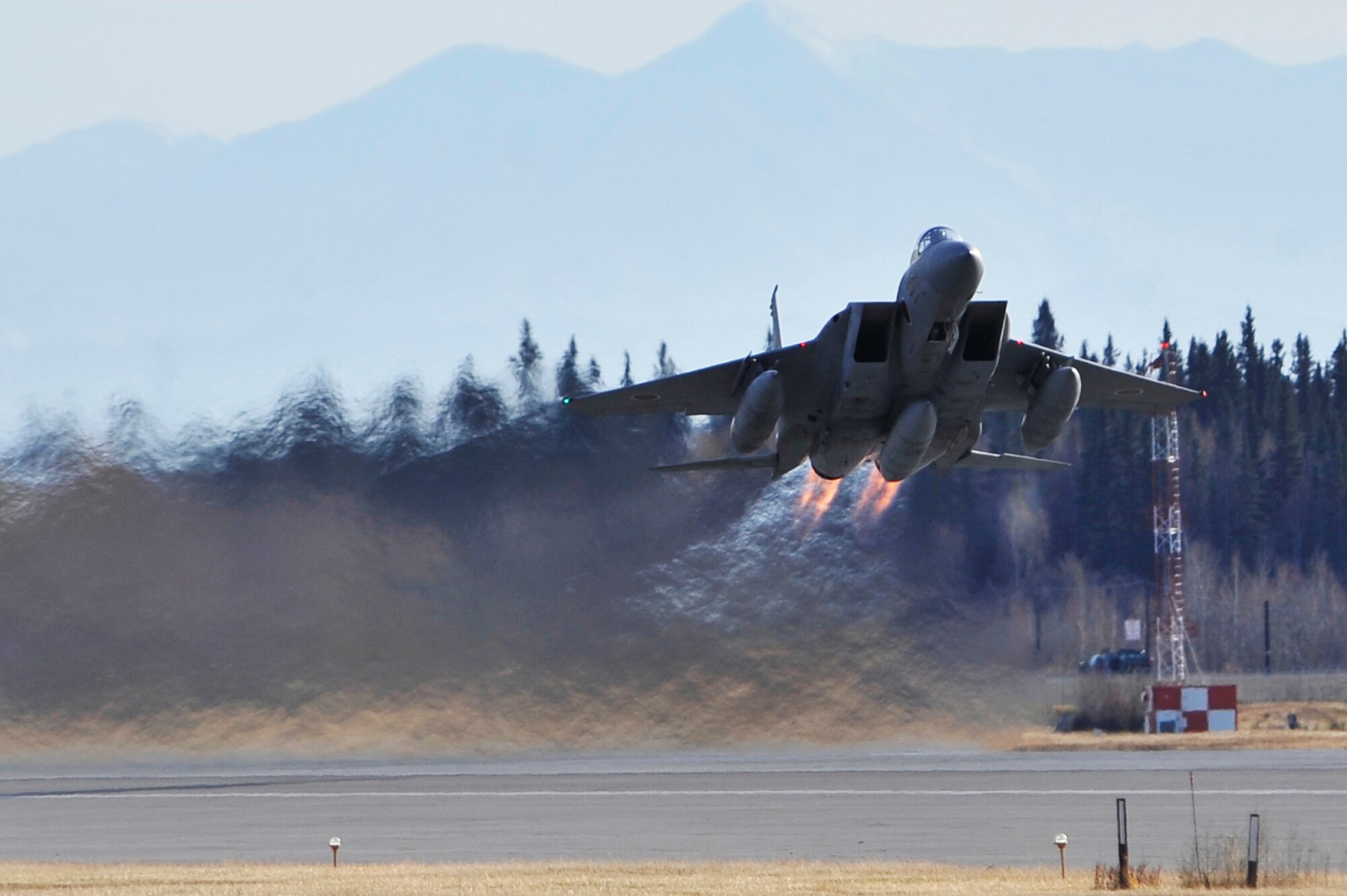 An F-15 Eagle from the Japan Air Self-Defense Force takes to the sky during RED FLAG-Alaska 10-1, Oct. 9, 2009, Eielson Air Force Base, Alaska. RF-A provides participants 67,000 square miles of airspace, more than 30 threat simulators, one conventional bombing range and two tactical bombing ranges containing more than 400 different types of targets. (U.S. Air Force photo/Staff Sgt. Christopher Boitz)