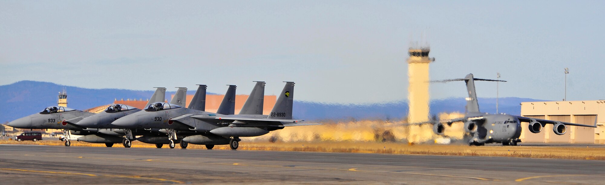 F-15 Eagle's from the Japan Air Self-Defense Force wait to take off during RED FLAG-Alaska 10-1, Oct. 9, 2009, Eielson Air Force Base, Alaska. RF-A is a Pacific Air Forces-directed field training exercise for United States and allied Forces to fly under simulated air-combat situations. (U.S. Air Force photo/Staff Sgt. Christopher Boitz)