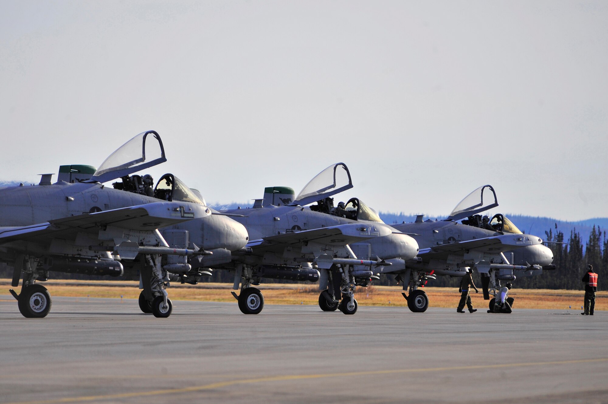 A-10 Thunderbolt II's line up on the runway during RED FLAG-Alaska 10-1, Oct. 9, 2009, Eielson Air Force Base, Alaska. RF-A provides participants 67,000 square miles of airspace, more than 30 threat simulators, one conventional bombing range and two tactical bombing ranges containing more than 400 different types of targets. The A-10's are assigned to Osan Air Base, Republic of Korea. (U.S. Air Force photo/Staff Sgt. Christopher Boitz)