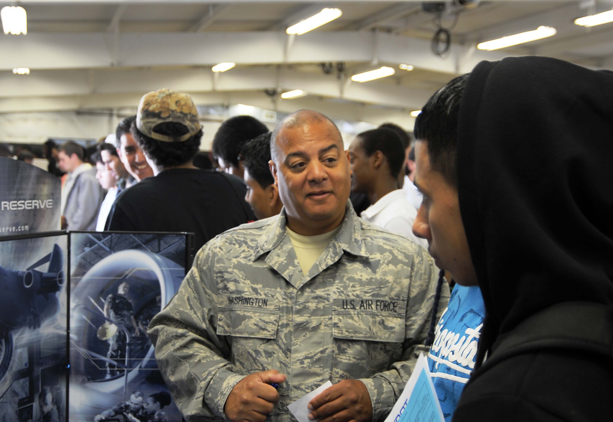At the Virginia Department of Transportation Career Fair Oct. 8 in Manassas, Virginia, Master Sgt. Lionel Washington, an aircraft mechanic with the 459th Air Refueling Wing discussed the benefits of enlisting in the Air Force Reserve, his experiences with the KC-135R and the various career opportunities open to high school graduates.  The event hosted more than 700 high school students from Prince William County. (U.S. Air Force Photo/Captain Rebecca Garcia)
