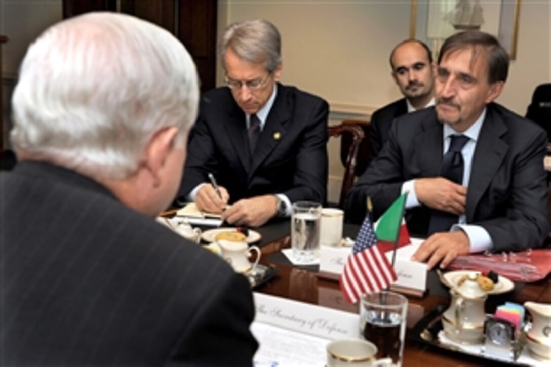 Italian Defense Minister Ignazio La Russa, right, meets with U.S. Defense Secretary Robert M. Gates, left foreground, at the Pentagon, Oct. 13, 2009, for bilateral security discussions.  Italy's Ambassador to the U.S. Giulio Terzi, center, also participated in the talks. 