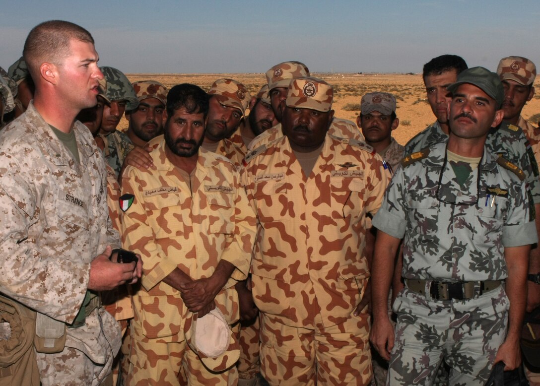 2nd Lt. John B. Strange, 1st Platoon Commander with Lima Company, Battalion Landing Team, 3rd Battalion, 2nd Marine Regiment, 22nd Marine Expeditionary Unit and native of Madison, Ala., speaks to Middle Eastern military leaders about U.S. weapons systems during Exercise Bright Star 2009 in Egypt, Oct. 13, 2009. The multinational exercise is designed to improve readiness, interoperability, and strengthen the military and professional relationships among U.S., Egyptian and participating forces. Bright Star is conducted by U.S. Central Command and held every two years. Elements of the 22nd MEU are currently are participating in the multi-national exercise while serving as the theater reserve force for U.S. Central Command. (Official Marine Corps Photo by Cpl. Justin M. Martinez)