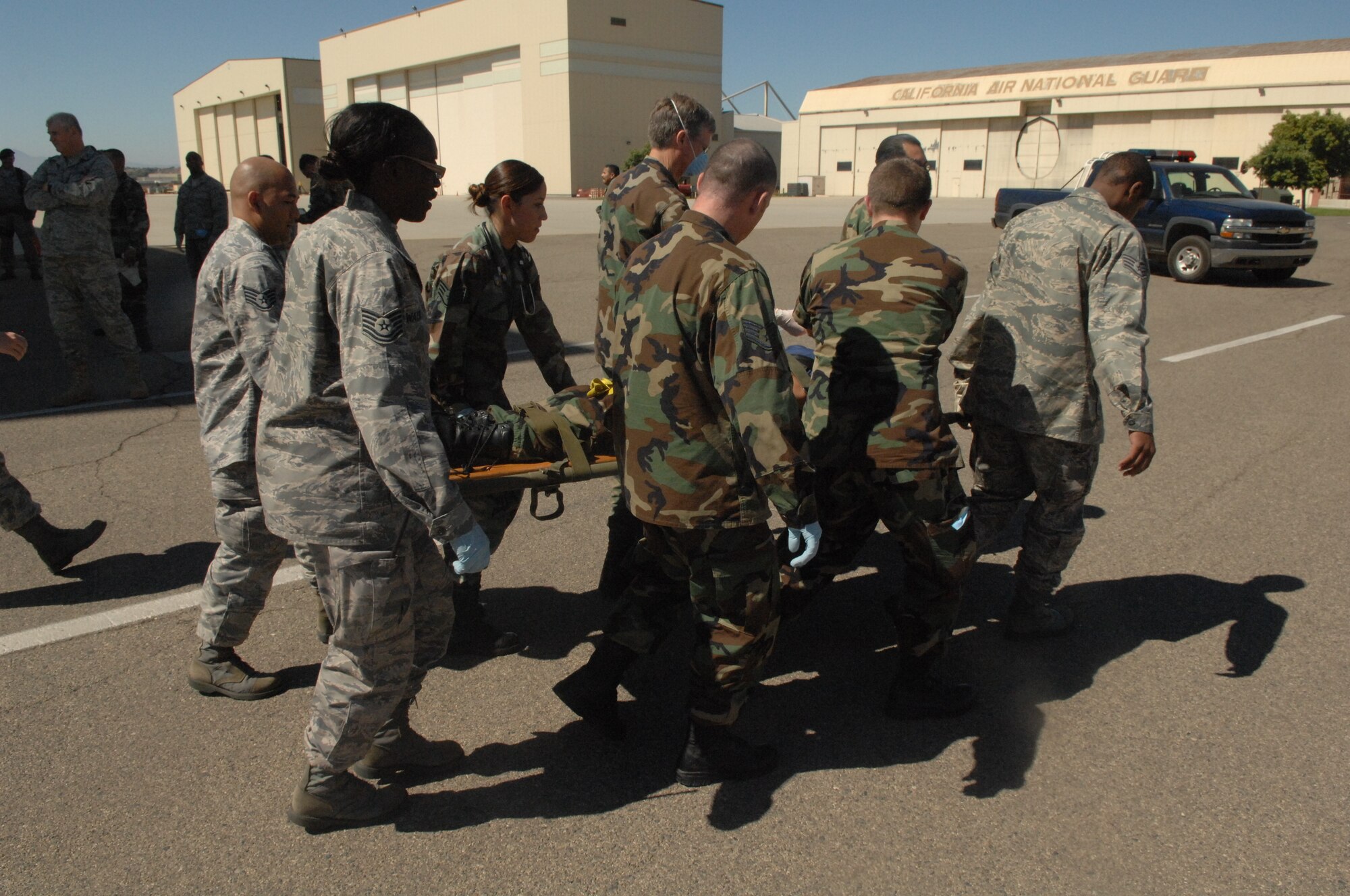 Medical personnel remove injured from the accident scene. (U.S. Air Force photo by Maj. David Sell)