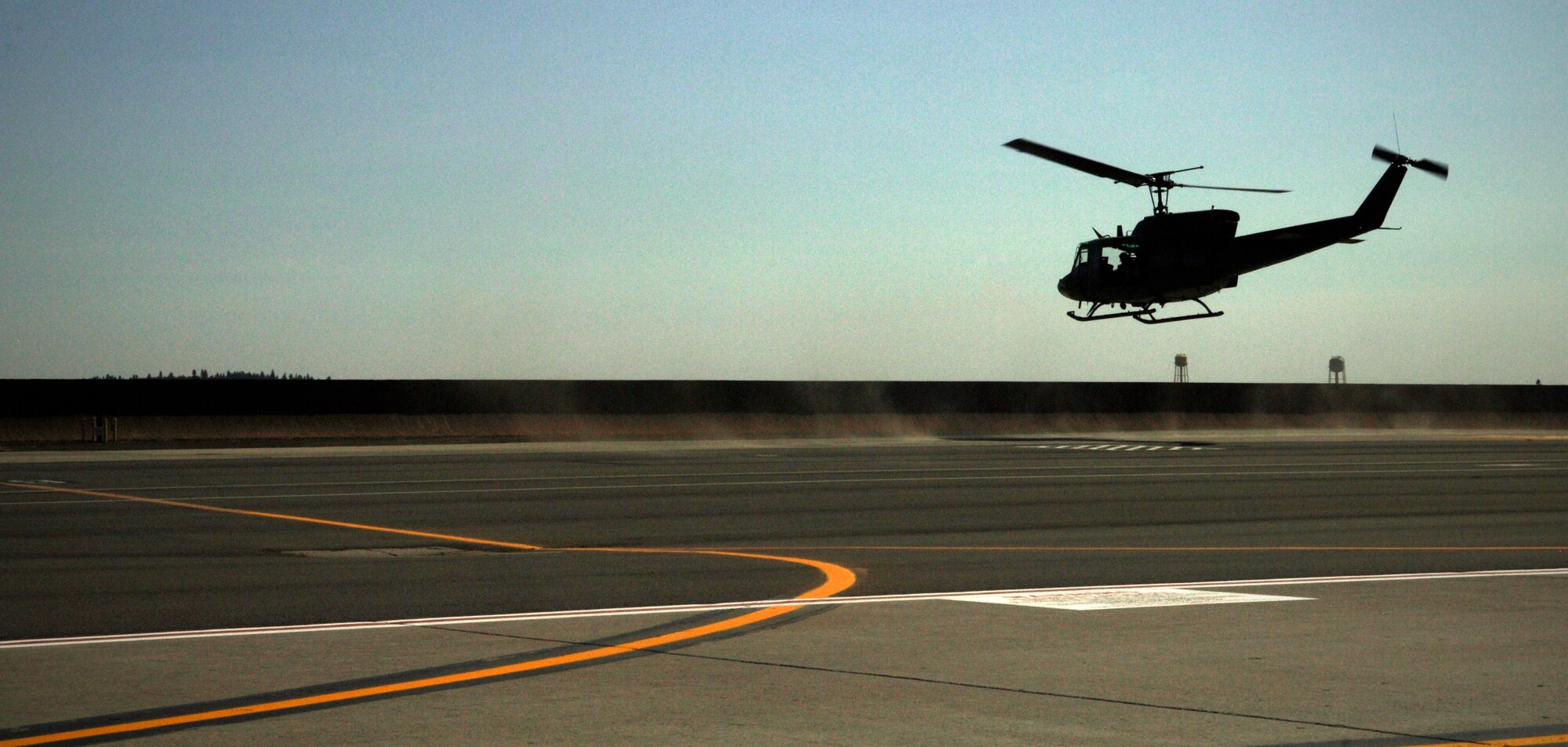 Members of the 36th Rescue Flight here take off in a U-H1N Huey helicopter to conduct a search and rescue Aug. 29. (US Air Force photo/ Joshua K. Chapman)