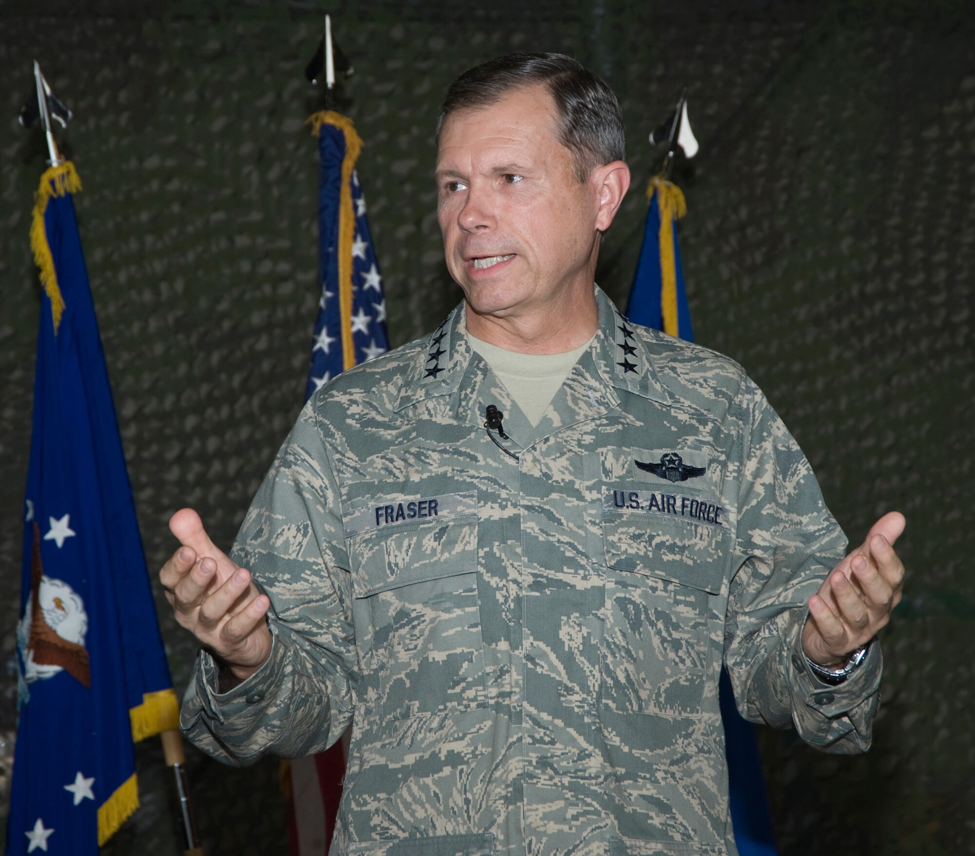 Gen. William Fraser, Air Combat Command commander, speaks to 53rd Wing members during a commander's call Oct. 13 at Eglin Air Force Base, Fla.  The general visited Eglin's ACC units and met with base leadership to learn more about how Eglin contributes to his command and the warfighter.  (Air Force photo/ Greg Murry.)  