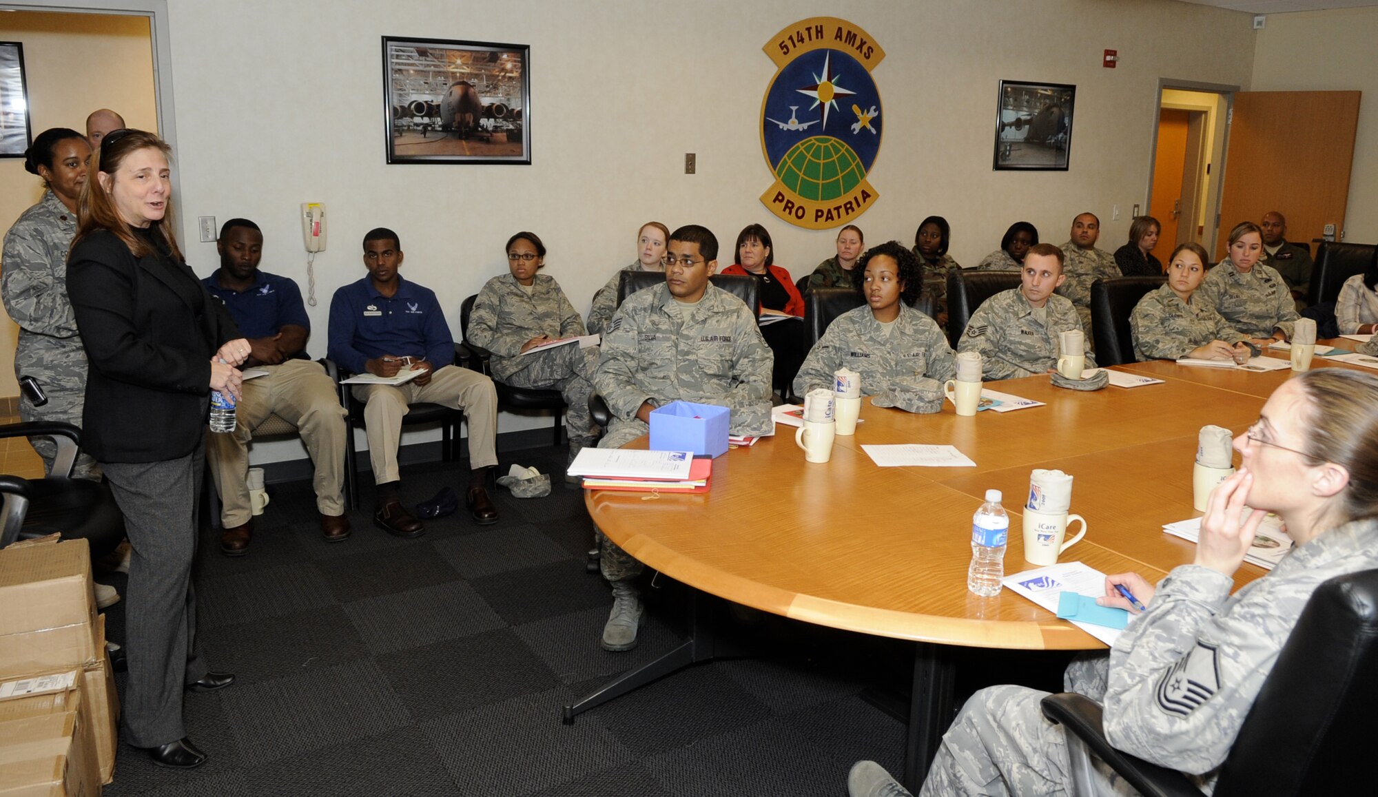 2009 Combined Federal Campaign key workers listen as Valerie Scott, CFC representative from United Way,  explains the importance of giving. The CFC is the sole authorized fundraising campaign taken on by federal employees. This year, key workers will be spreading the message: “I Care: Now More Than Ever”. (U.S. Air Force photo/Carlos Cintron)