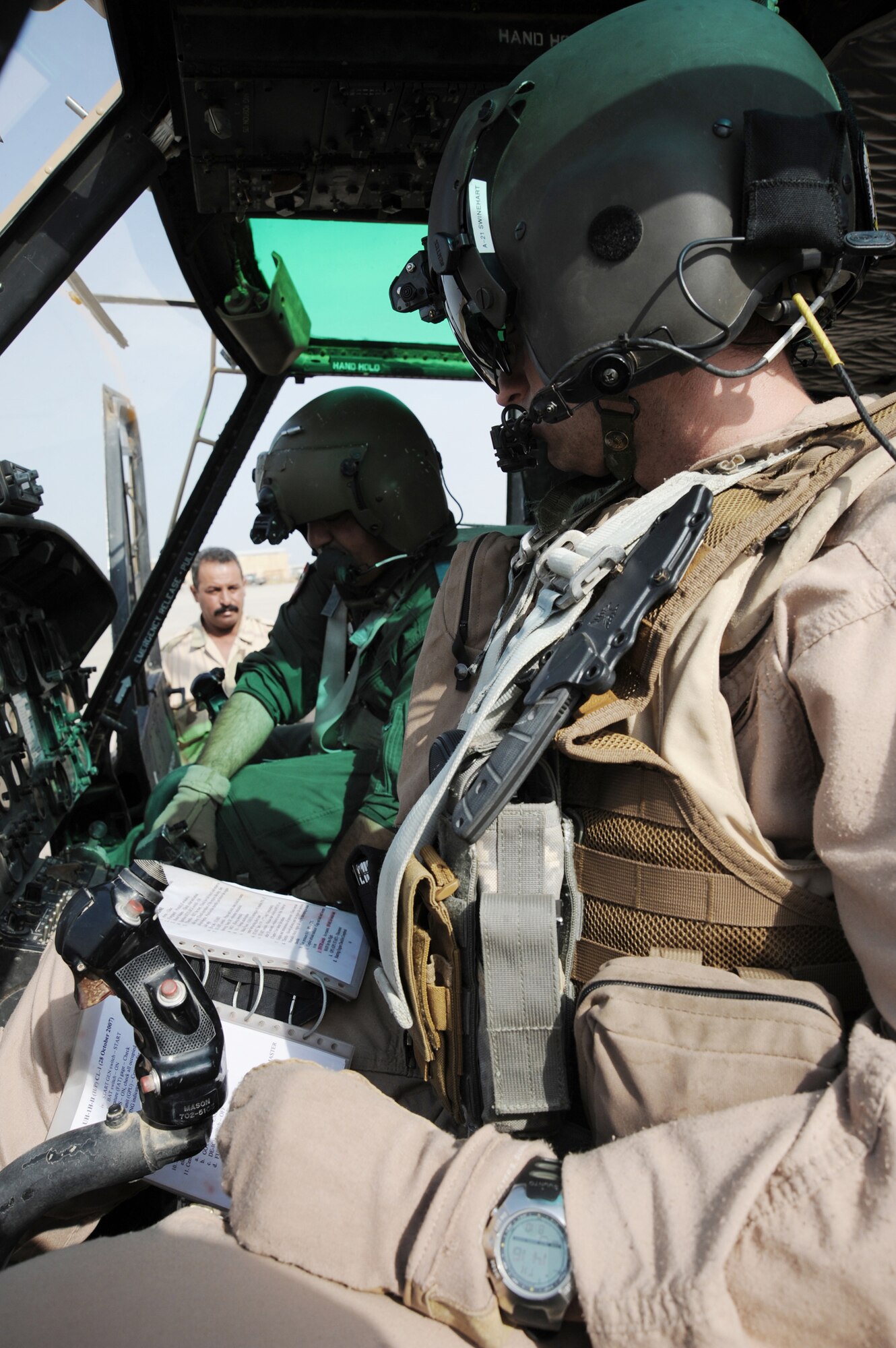 Airmen train advise assist Iraqi helicopter pilots Air Force