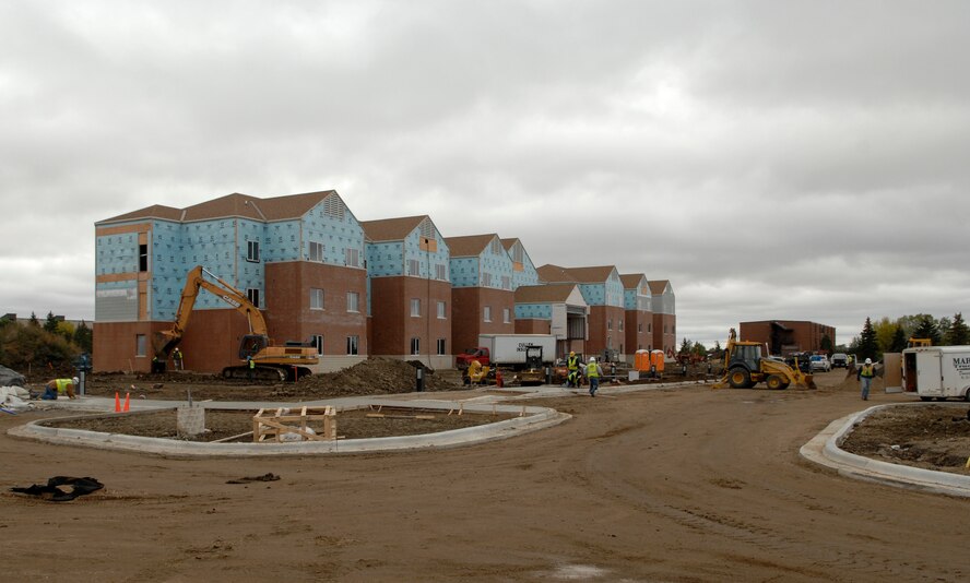 MINOT AIR FORCE BASE, N.D. -- Workers construct the new enlisted dormitories here, Oct.  7. The dorms are being built to help improve the comfort of living and decrease the shortage of rooms for junior enlisted members. (U.S. Air Force photo by Senior Airman Matthew Smith)