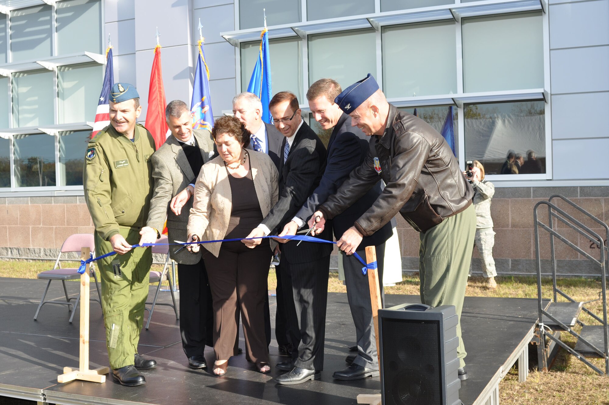 Local community leaders, along with Brig. Gen. Andr? Viens, deputy commander, Continental United States North American Aerospace Defense Command Region, and Col. John Bartholf, Eastern Air Defense Sector commander, cut the ribbon Oct. 2. The unit officially marked the completion of the new headquarters building with a ribbon cutting ceremony.