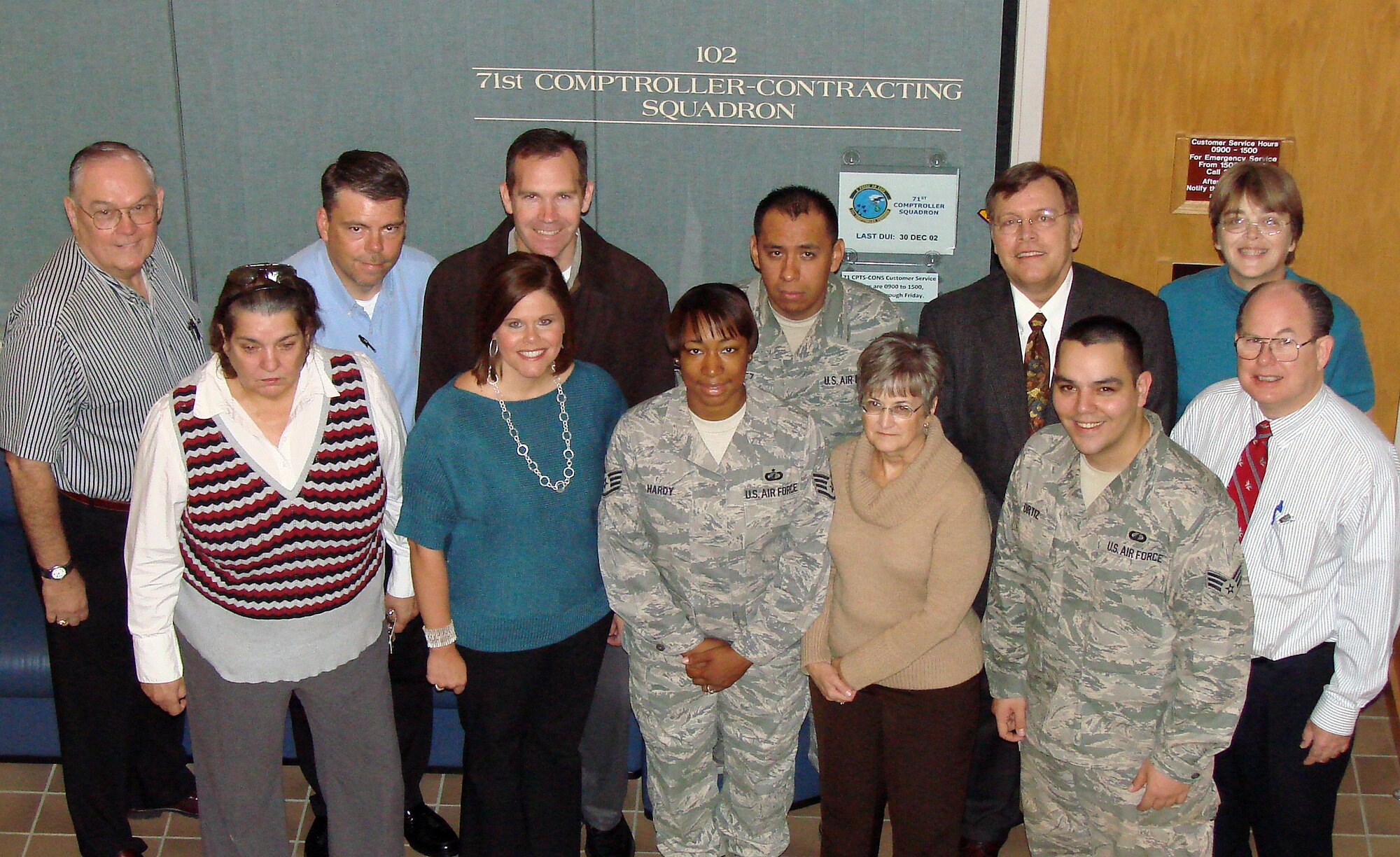 The 71st Flying Training Wing Warriors of the Week are: first row from the left, Rose Palacios, Holly Eckstein, Staff Sgt. Crystal Hardy, Nellie Martin, Senior Airman William Ortiz and Thomas Patton; second row from left, Dave Gindelsberger, Tim Roberts, Lance Holmes, Staff Sgt. Joseph Lopez, Phil Gainey and Debra Poland. Not in picture are Gene Gould and 1st Lt. Tara Nelson. They are all with the 71st Comptroller-Contracting Squadron here. (U.S. Air Force photo/ Joe B. Wiles)