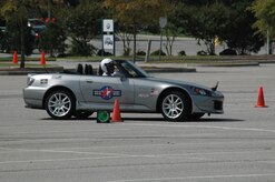 Maj. David Ball races his Honda S2000 in a recent autocross race in North Charleston. Major Ball is a Reserve flight nurse with the 315th Aeromedical Evacuation Squadron. (U.S. Air Force Photo/Capt. Wayne Capps) 
