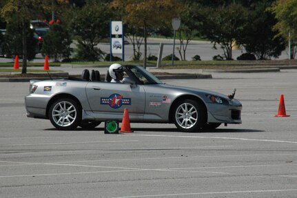Major David Ball, a Reserve Flight Nurse with the 315th Aeromedical Evacuation Squadron at Charleston, AFB, S.C., races his Honda S2000 in a recent autocross race in North Charleston, S.C.  Maj. Ball is in his second season as an autocross racer.  (U.S. Air Force Photo/Capt. Wayne Capps)