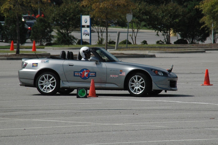 Major David Ball, a Reserve Flight Nurse with the 315th Aeromedical Evacuation Squadron at Charleston, AFB, S.C., races his Honda S2000 in a recent autocross race in North Charleston, S.C.  Maj. Ball is in his second season as an autocross racer.  (U.S. Air Force Photo/Capt. Wayne Capps)
