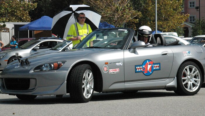 Major David Ball, a Reserve Flight Nurse with the 315th Aeromedical Evacuation Squadron at Charleston, AFB, S.C., prepares his Honda S2000 for an upcoming autocross race.  Maj. Ball is in his second season as an autocross racer.  (U.S. Air Force Photo/Capt. Wayne Capps)