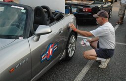 Maj. David Ball, who is in his second season as an autocross racer prepares his Honda S2000 for an upcoming. Major Ball is a flight nurse with the 315th Aeromedical Evacuation Squadron. (U.S. Air Force Photo/Capt. Wayne Capps) 
