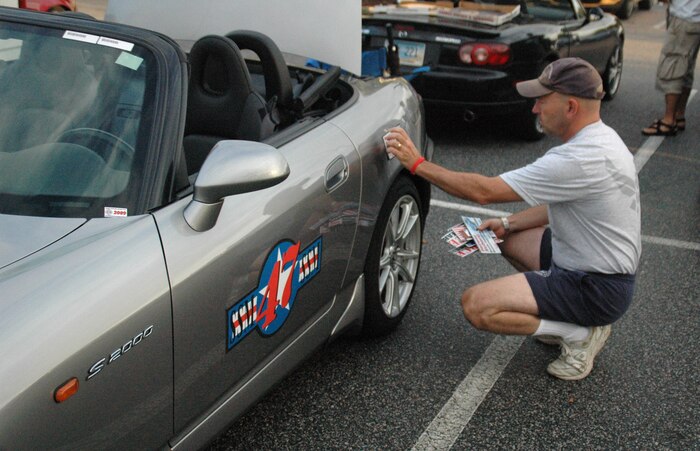 Major David Ball, a Reserve Flight Nurse with the 315th Aeromedical Evacuation Squadron at Charleston, AFB, S.C., prepares his Honda S2000 for an upcoming autocross race.  Maj. Ball is in his second season as an autocross racer.  (U.S. Air Force Photo/Capt. Wayne Capps)