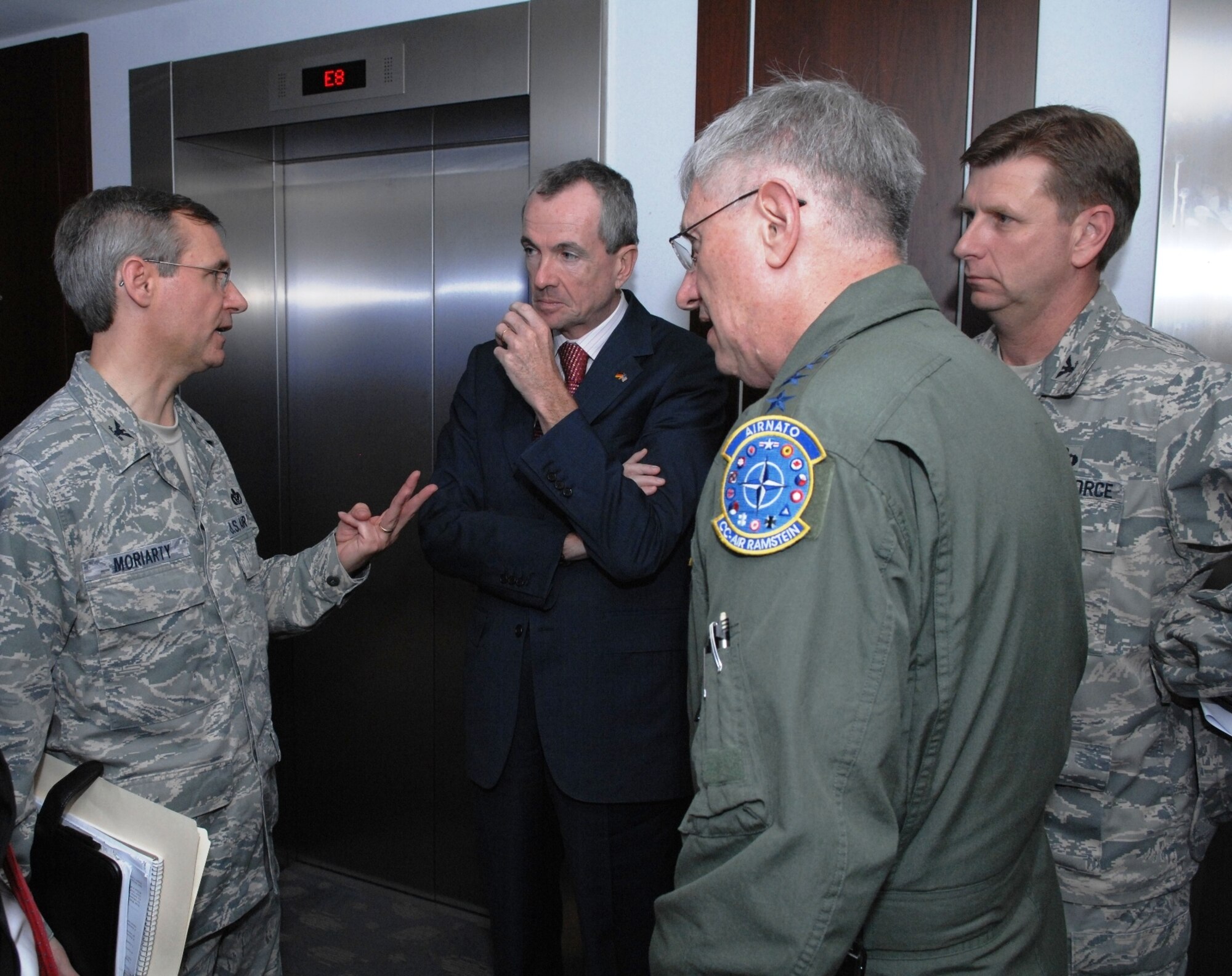 RAMSTEIN AIR BASE, Germany-- Mr. Philip D. Murphy, U.S. Ambassador to Germany, takes a tour through facilities at Ramstein Air Base Germany with Gen. Roger Brady, U.S. Air Forces in Europe commander, during his visit to the Kaiserslautern Military Community Oct. 8. Ambassador Murphy is briefed by Col. Robert Moriarty (left), deputy director of installations and mission support for headquarters USAFE. (U.S. Air Force photo/Master Sgt. Corey Clements)
