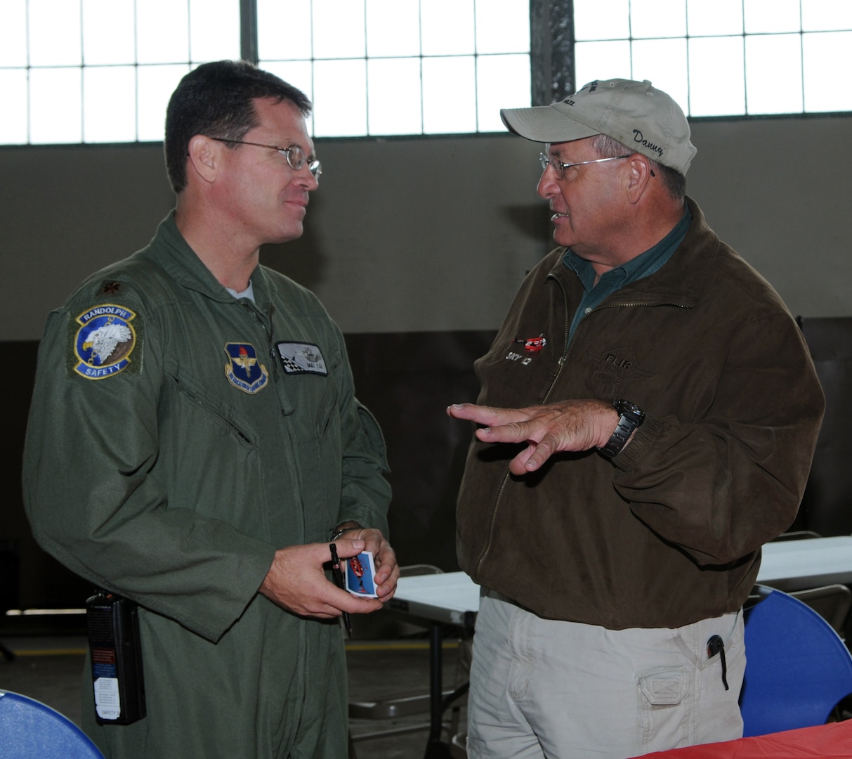 Maj. Matt Mantai from Randolph Safety and Danny Thompson a KSAT 12 News Pilot, talk about avoiding midair collisions.  (U.S. Air Force Photo By Don Lindsey)