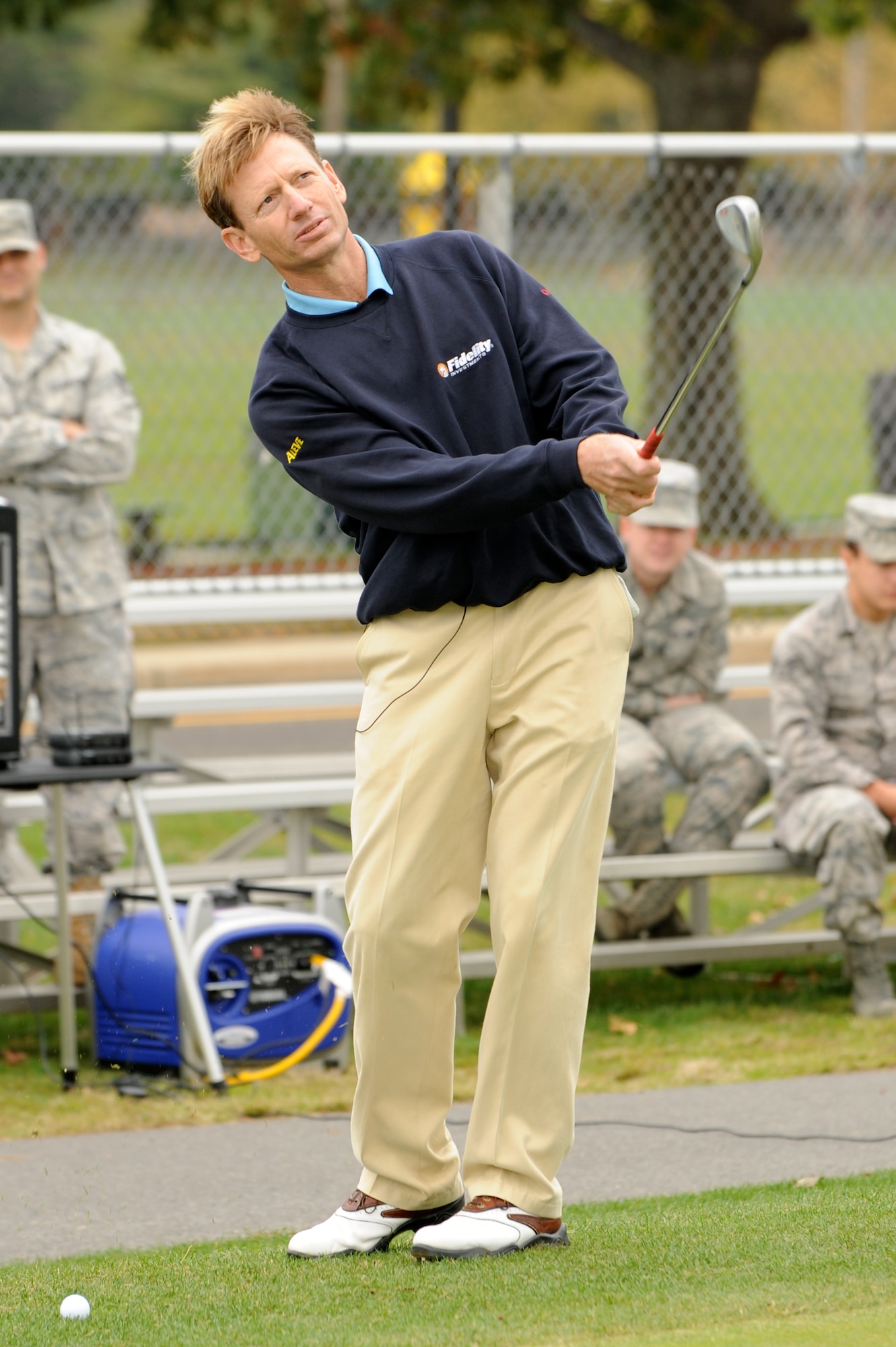 Professional Golf Association Tour player Brad Faxon instructs at the free golf clinic hosted  by the Joint Base McGuire-Dix-Lakehurst commissary Club here.  The golf clinic was the grand prize for the Northeast Region "Every Penny Counts" contest promotion.  During the promotion, one cent was donated  to the Fisher House Foundation for select products sold at the commissary. (U.S. Air Force photo/Wayne Russell)