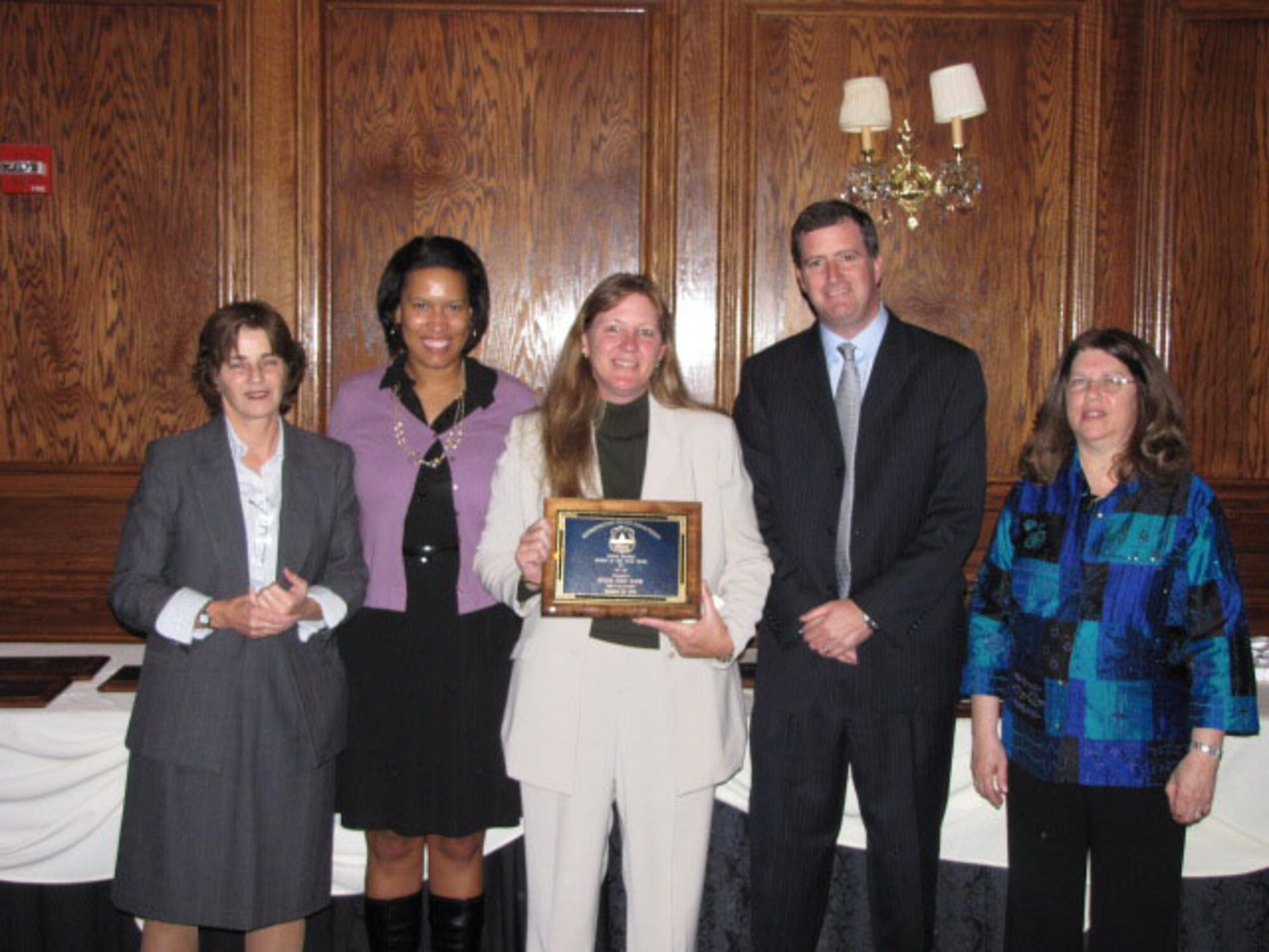 SEYMOUR JOHNSON AIR FORCE BASE, N.C. -- Susan Mayer (center) won Second District Police Officer of the Year for her civilian job as a Washington D.C. law enforcement agent.  Sergeant Mayer is a Reservist with the 916th Equal Opportunity Office.                        
