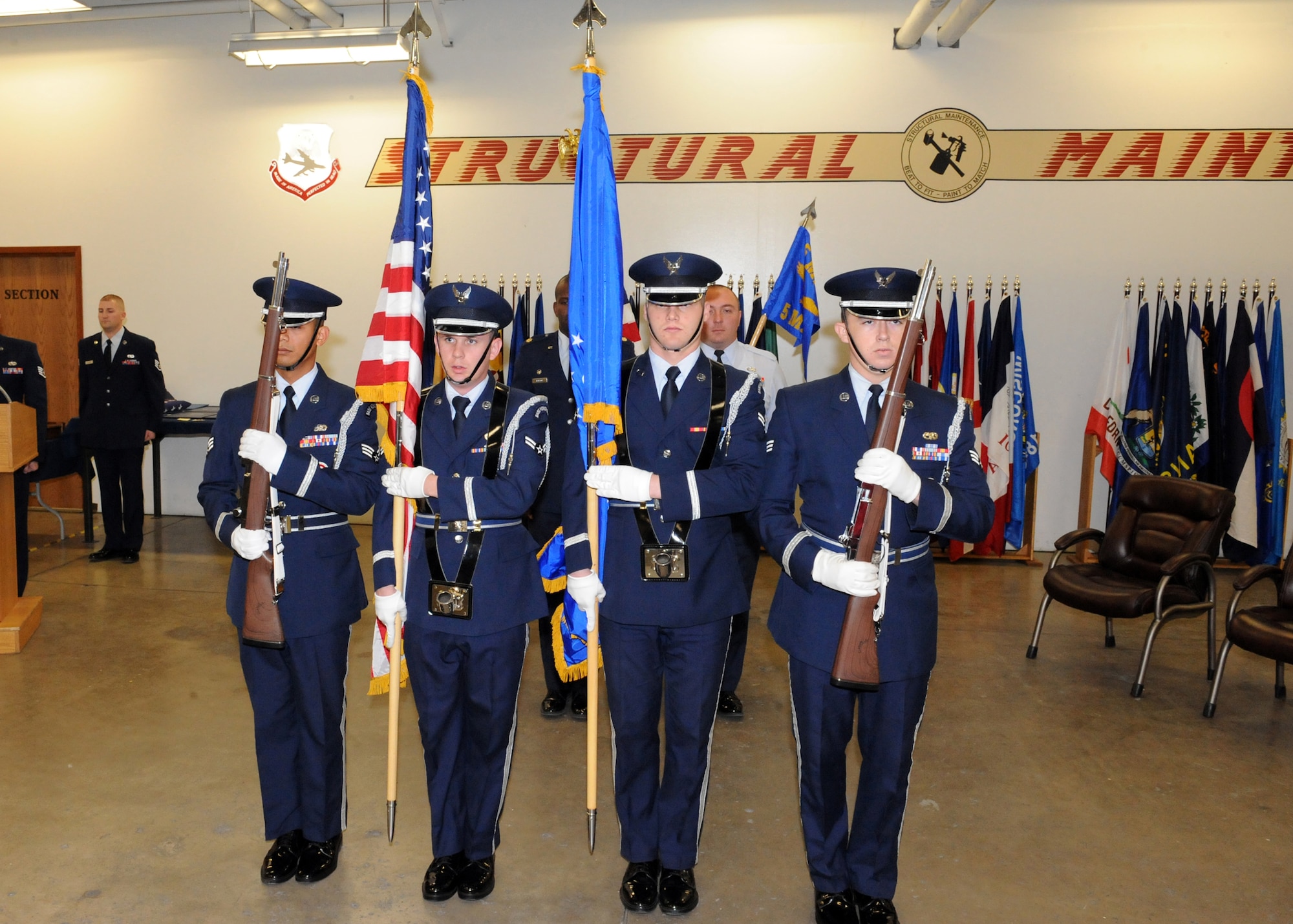 MINOT AIR FORCE BASE, N.D. -- Members of the base honor guard performs color guard duty at a retirement here, Oct. 9. Events such as retirements are just one of the many responsibilities the honor guard as for base personnel and the local community. (U.S. Air Force photo by Staff Sgt. Keith Ballard)