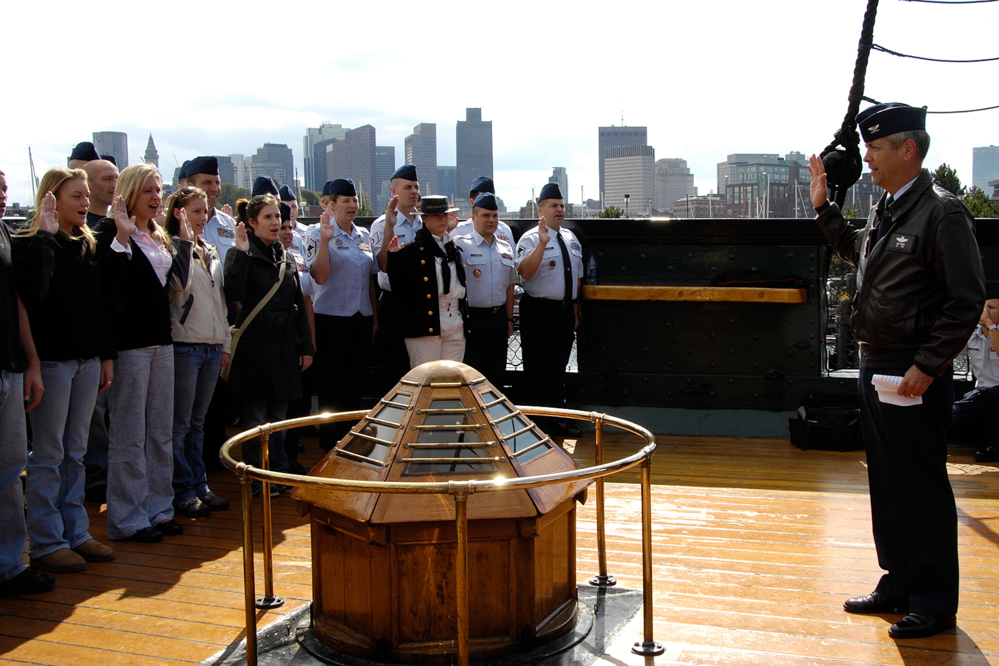HANSCOM AIR FORCE BASE, Mass. - Col. Robert Swain, 439th Airlift Wing commander at Westover Air Reserve Base, Mass., recites the oath of enlistment to a group of Air Force Reserve initial enlistees and recruiters Oct. 5 on board the U.S.S. Constitution docked at the Navy Yard in Charlestown, Mass. The Airmen originate from across the New England and New York regions. The U.S.S. Constitution is the oldest commissioned naval vessel afloat in the world and is known as “Old Ironsides” for its successful naval battles during the Franco-American war and the War of 1812. (U.S. Air Force photo by Linda LaBonte Britt)