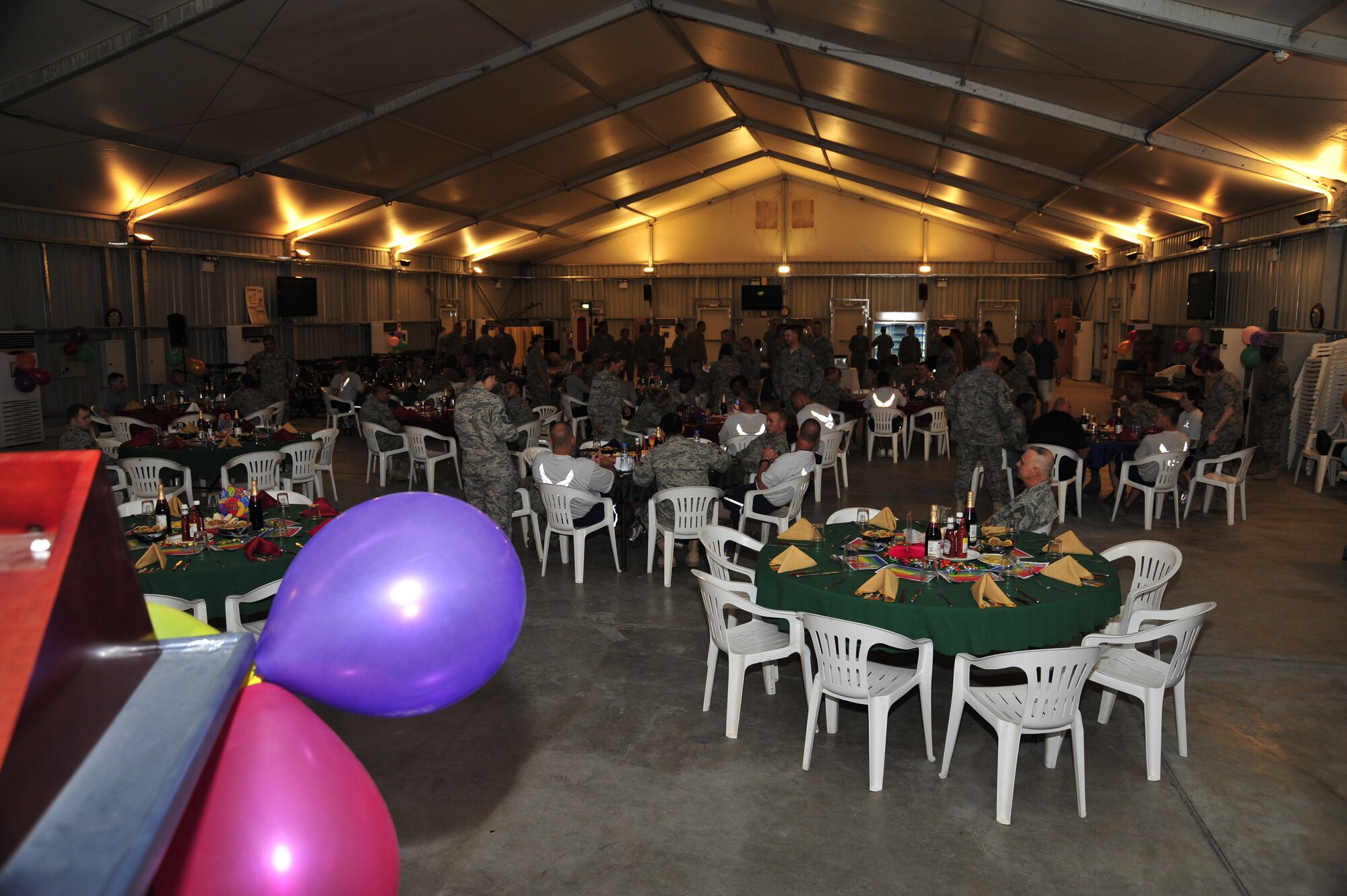 SOUTHWEST ASIA—A dinner for servicemembers whose birthday occurs in October is held here, Oct 13, 2009. The Navy also was recognized for its 234rd birthday (U.S. Air Force Photo by 2nd Lt. Kidron B. Vestal)
