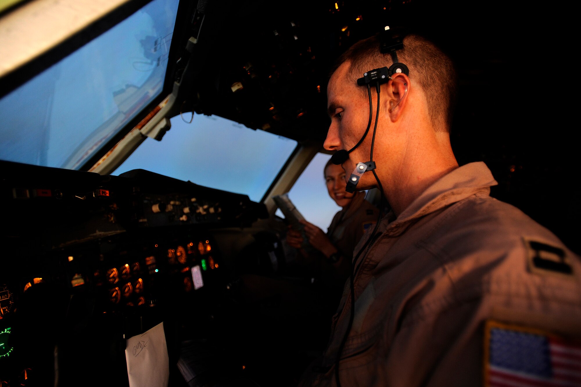 AFGHANISTAN - U.S. Air Force Captains Cam Radon, foreground, and Sasha Heath pilot a KC-10A Extender, from the 908th Expeditionary Air Refueling Squadron, over Afghanistan, Sept. 30, 2009.  Both are deployed from McGuire Air Force Base, N.J.  (U.S. Air Force photo/Staff Sgt. Michael B. Keller)