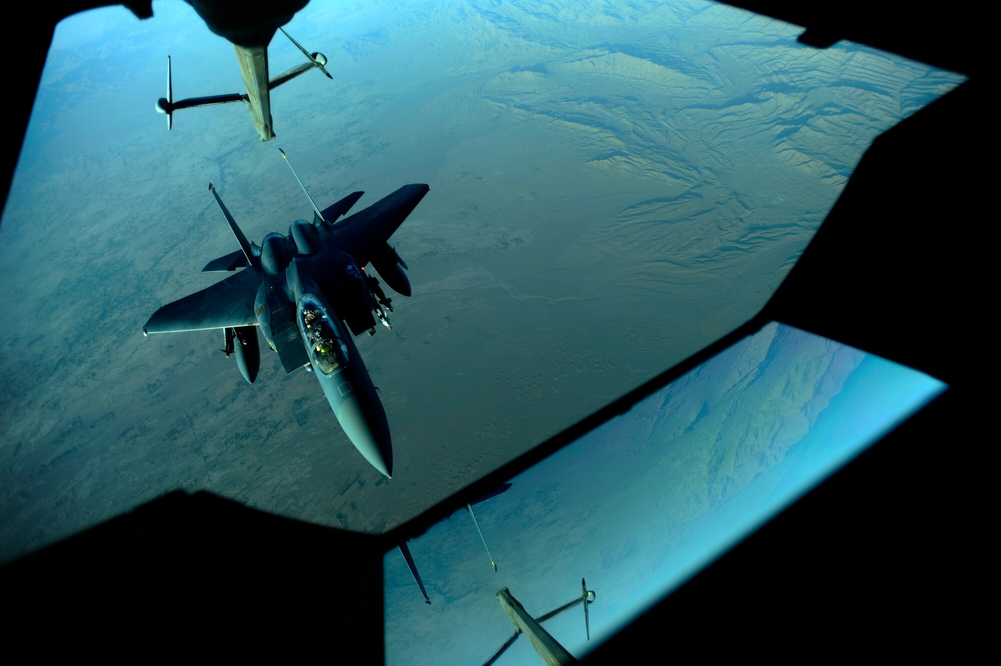 AFGHANISTAN - A U.S. Air Force F-15 Strike Eagle departs a 908th Air Refueling Squadron KC-10A Extender after being refueled over Afghanistan, Oct. 2, 2009.  (U.S. Air Force photo/Staff Sgt. Michael B. Keller)