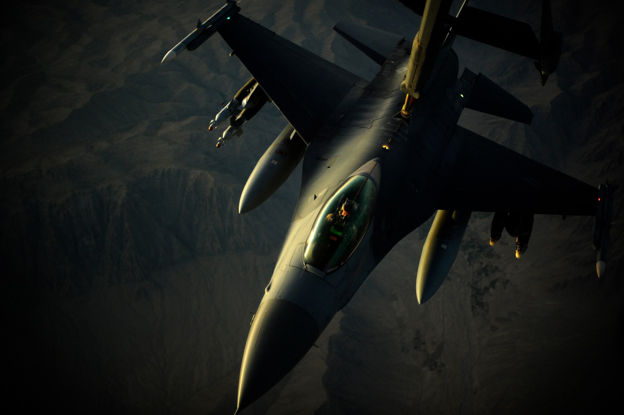 AFGHANISTAN - A U.S. Air Force F-16 Fighting Falcon is refueled by a 908th Air Refueling Squadron KC-10A Extender over Afghanistan, Oct. 2, 2009.  (U.S. Air Force photo/Staff Sgt. Michael B. Keller)