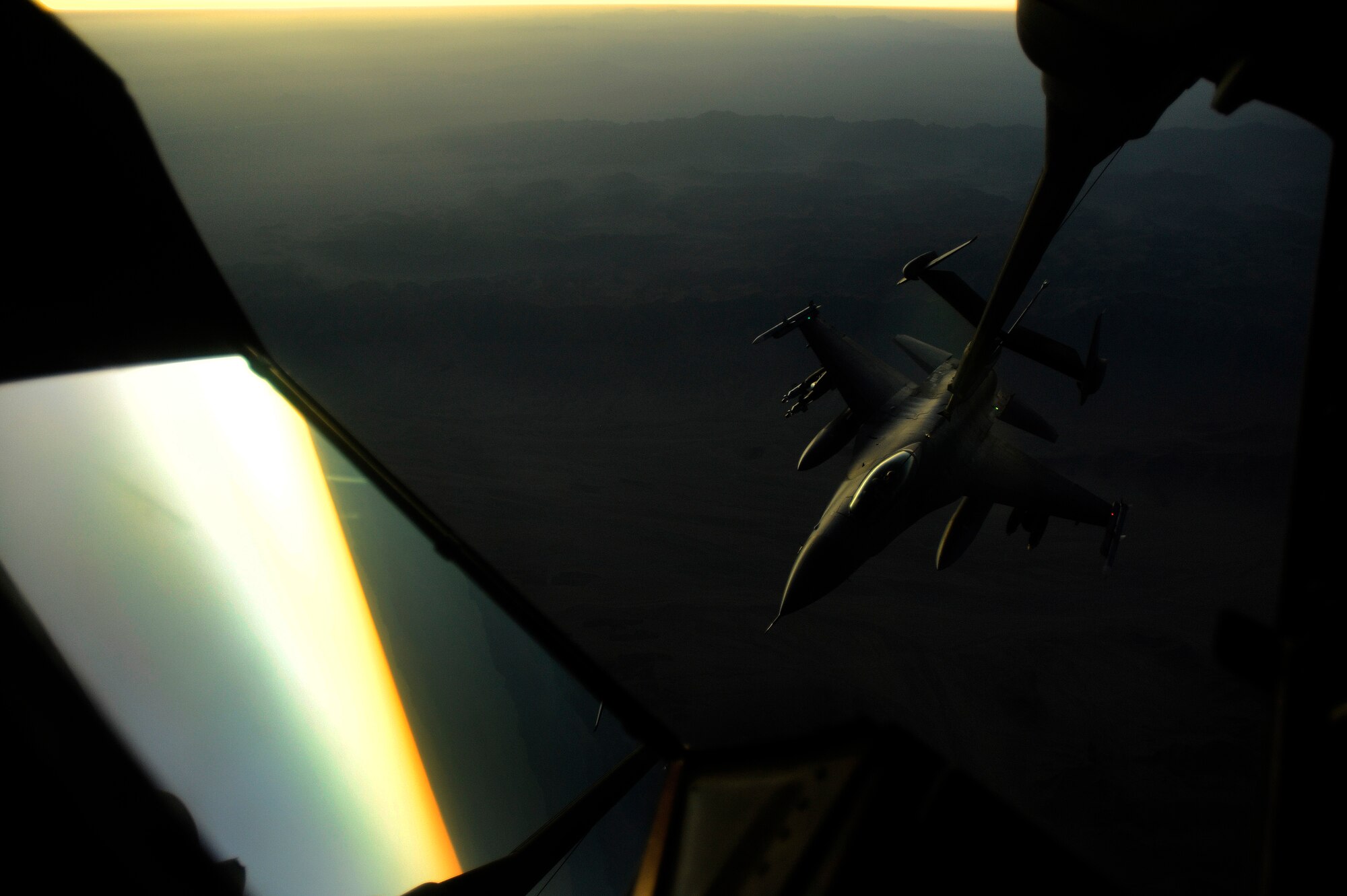 AFGHANISTAN - A U.S. Air Force F-16 Fighting Falcon is refueled by a 908th Air Refueling Squadron KC-10A Extender over Afghanistan, Oct. 2, 2009.  (U.S. Air Force photo/Staff Sgt. Michael B. Keller)
