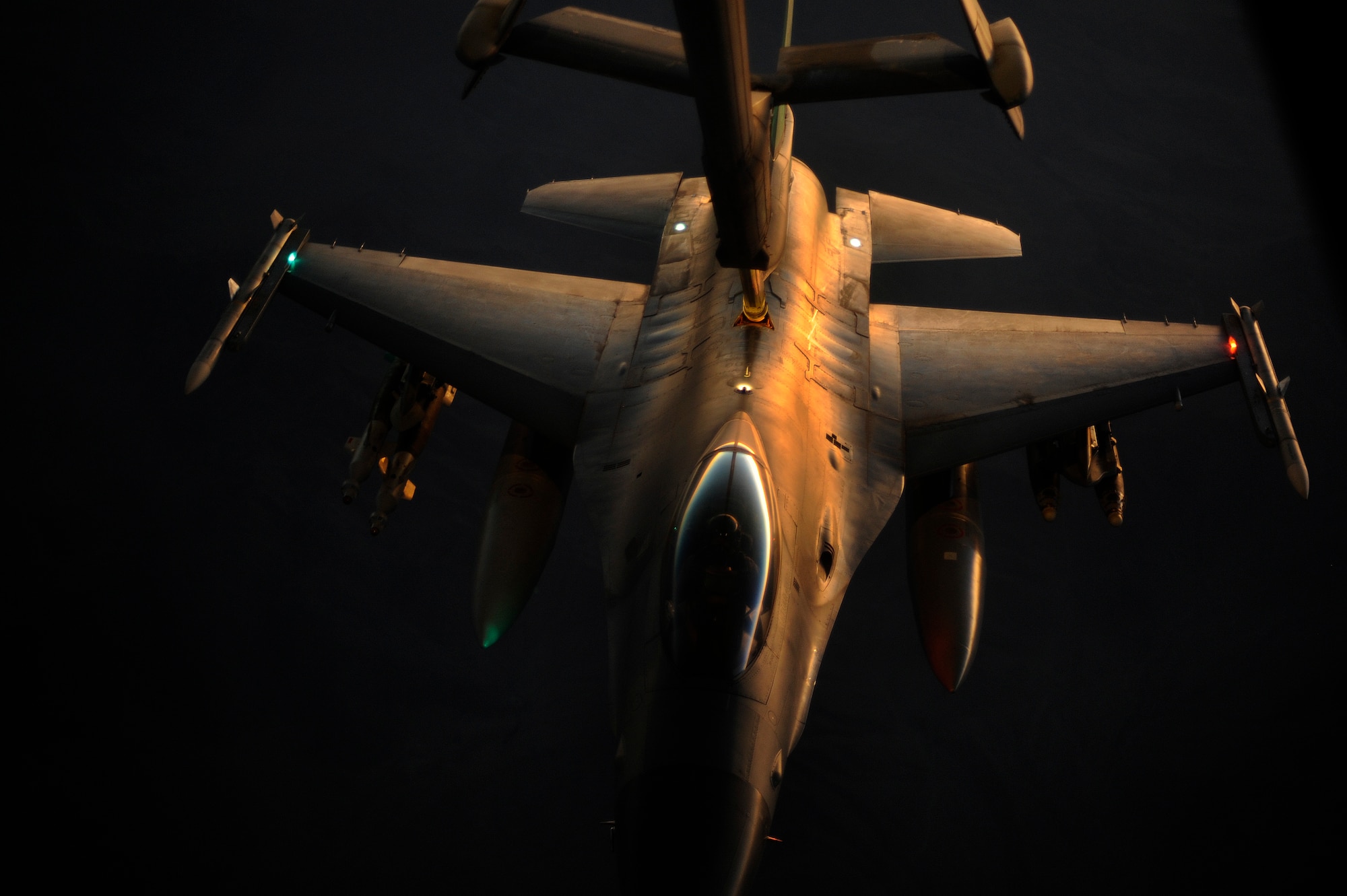 AFGHANISTAN - A U.S. Air Force F-16 Fighting Falcon is refueled by a 908th Air Refueling Squadron KC-10A Extender over Afghanistan, Oct. 2, 2009.  (U.S. Air Force photo/Staff Sgt. Michael B. Keller)