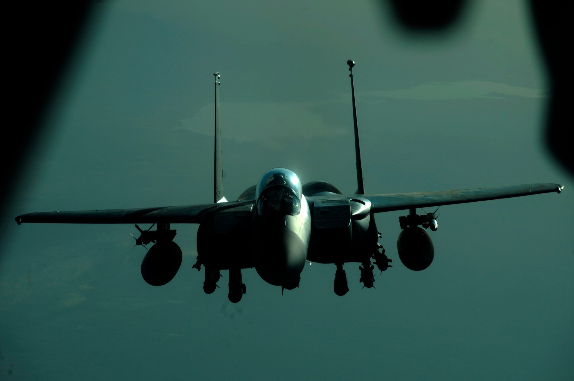 AFGHANISTAN - A U.S. Air Force F-15 Strike Eagle approaches a 908th Air Refueling Squadron KC-10A Extender to be refueled over Afghanistan, Oct. 2, 2009.  (U.S. Air Force photo/Staff Sgt. Michael B. Keller)