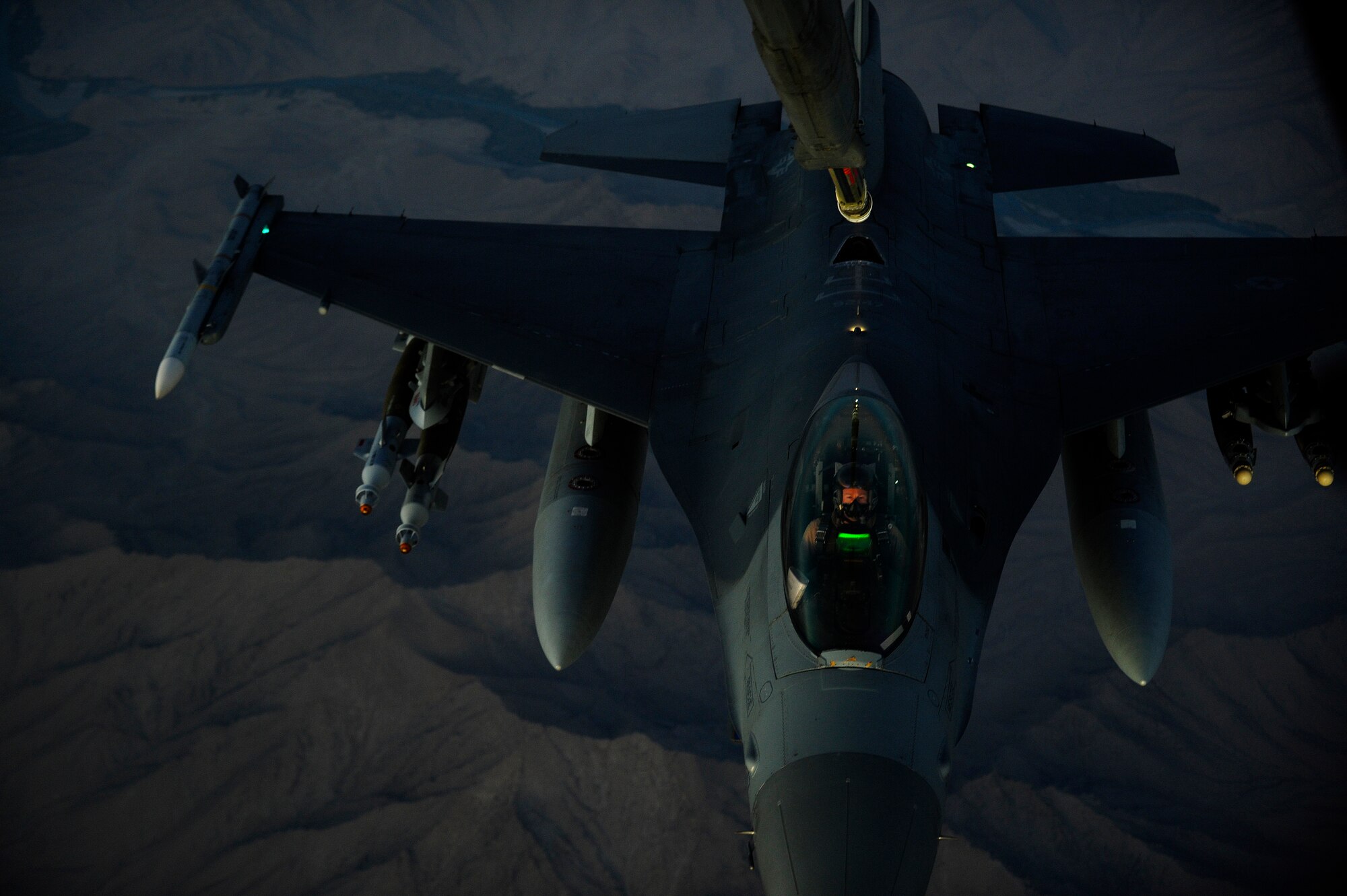 AFGHANISTAN - A U.S. Air Force F-16 Fighting Falcon approaches a 908th Air Refueling Squadron KC-10A Extender to be refueled over Afghanistan, Oct. 2, 2009.  (U.S. Air Force photo/Staff Sgt. Michael B. Keller)
