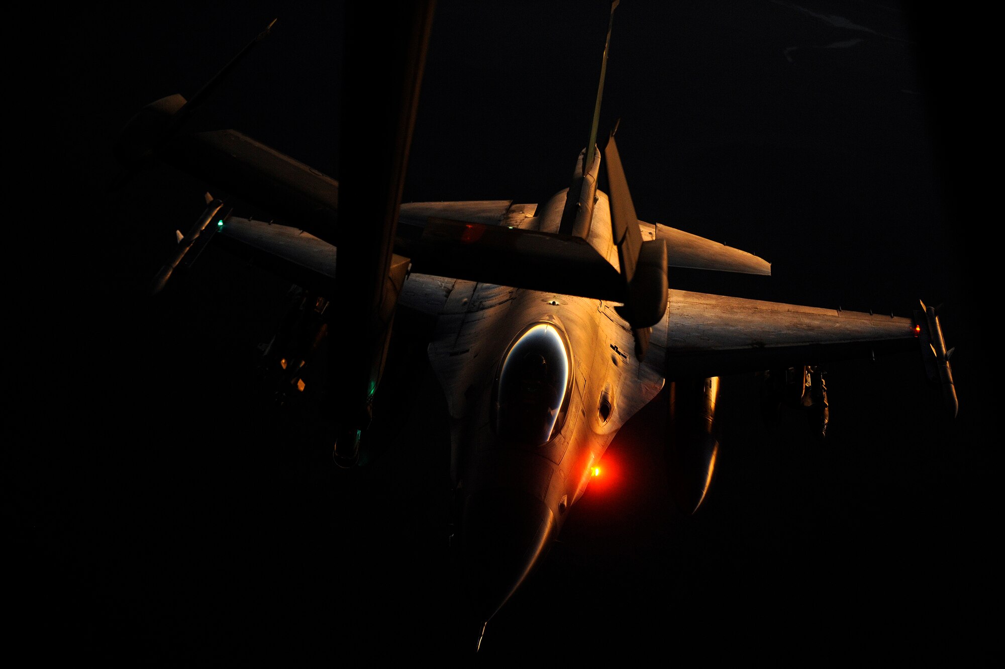 AFGHANISTAN - A U.S. Air Force F-16 Fighting Falcon approaches a 908th Air Refueling Squadron KC-10A Extender to be refueled over Afghanistan, Oct. 2, 2009.  (U.S. Air Force photo/Staff Sgt. Michael B. Keller)