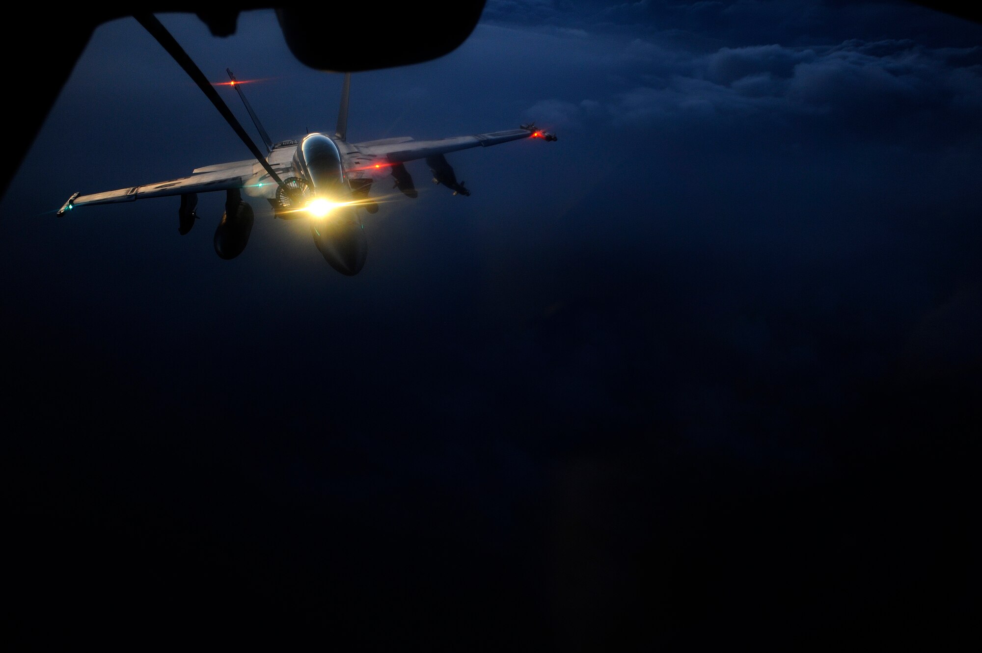 AFGHANISTAN - A U.S. Navy F-18 Hornet receives fuel from a 908th Expeditionary Air Refueling Squadron KC-10A Extender over Afghanistan, Oct. 5, 2009.  (U.S. Air Force photo/Staff Sgt. Michael B. Keller)