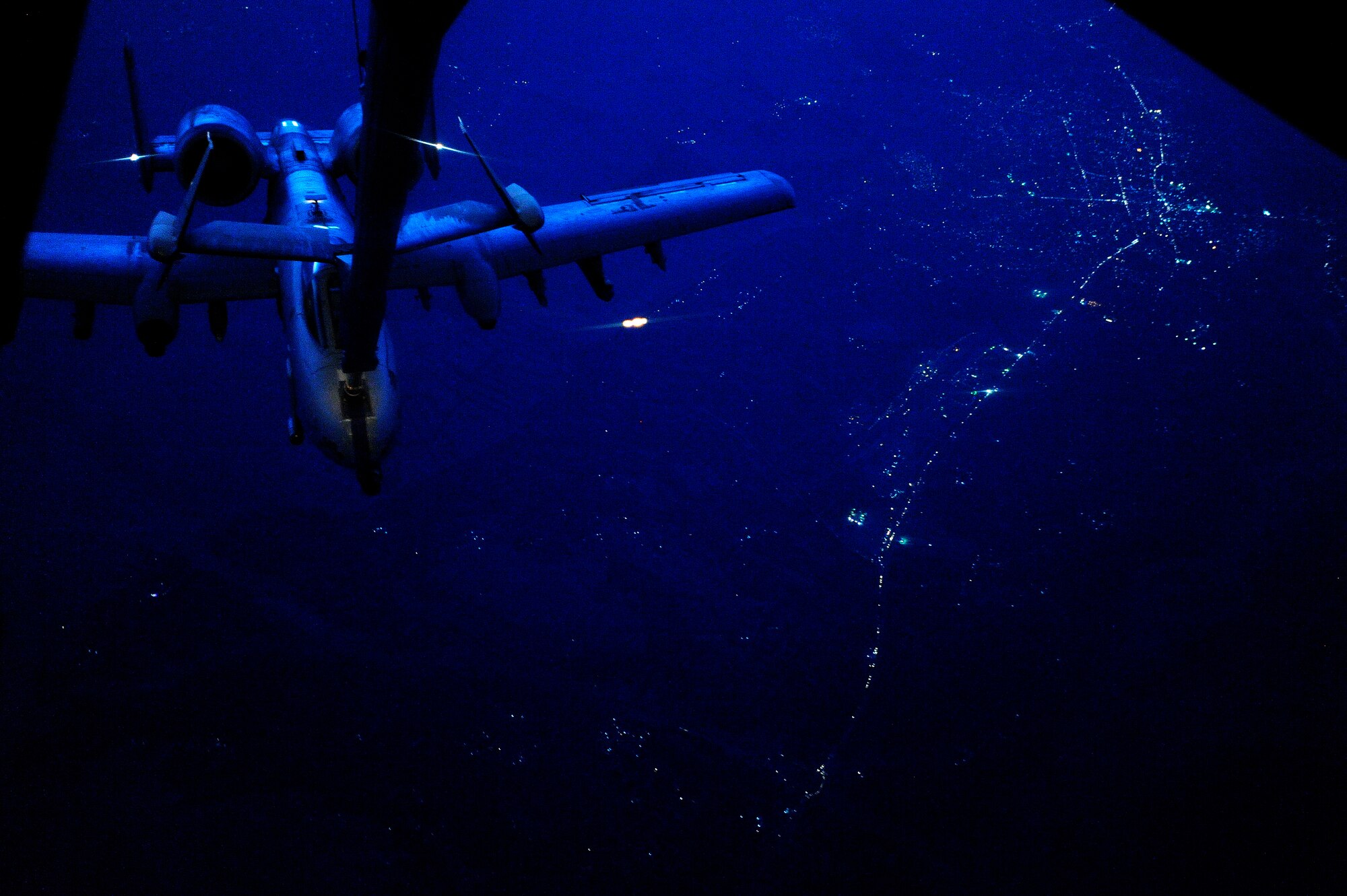 AFGHANISTAN - A U.S. Air Force A-10 Thunderbolt II receives fuel from a 908th Expeditionary Air Refueling Squadron KC-10A Extender over Afghanistan, Oct. 5, 2009.  (U.S. Air Force photo/Staff Sgt. Michael B. Keller)