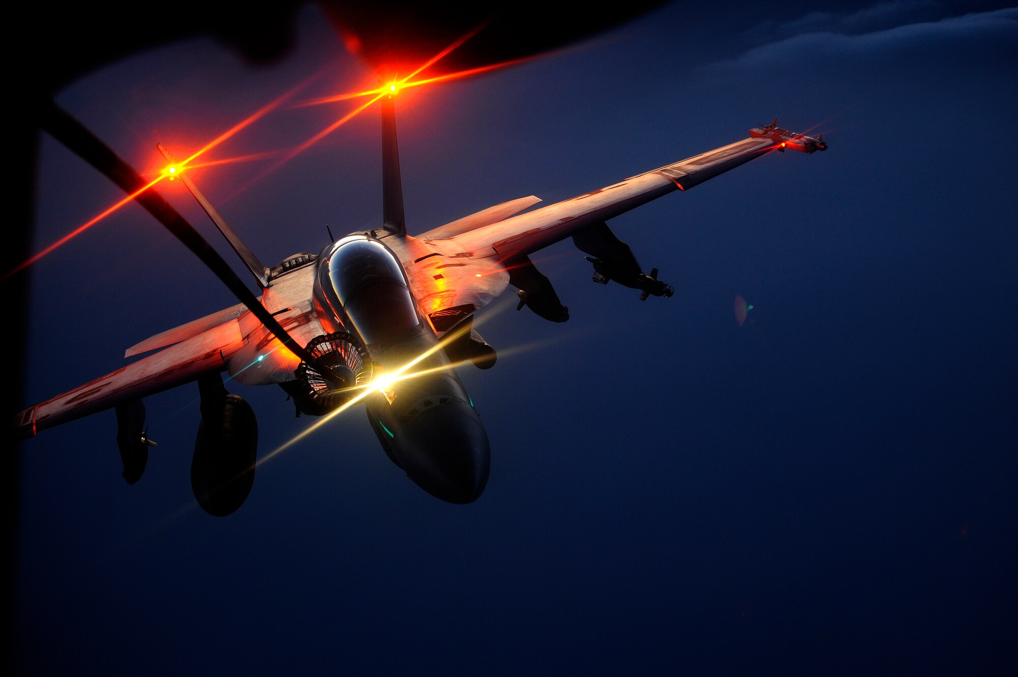 AFGHANISTAN - A U.S. Navy F-18 Hornet receives fuel from a 908th Expeditionary Air Refueling Squadron KC-10A Extender over Afghanistan, Oct. 5, 2009.  (U.S. Air Force photo/Staff Sgt. Michael B. Keller)