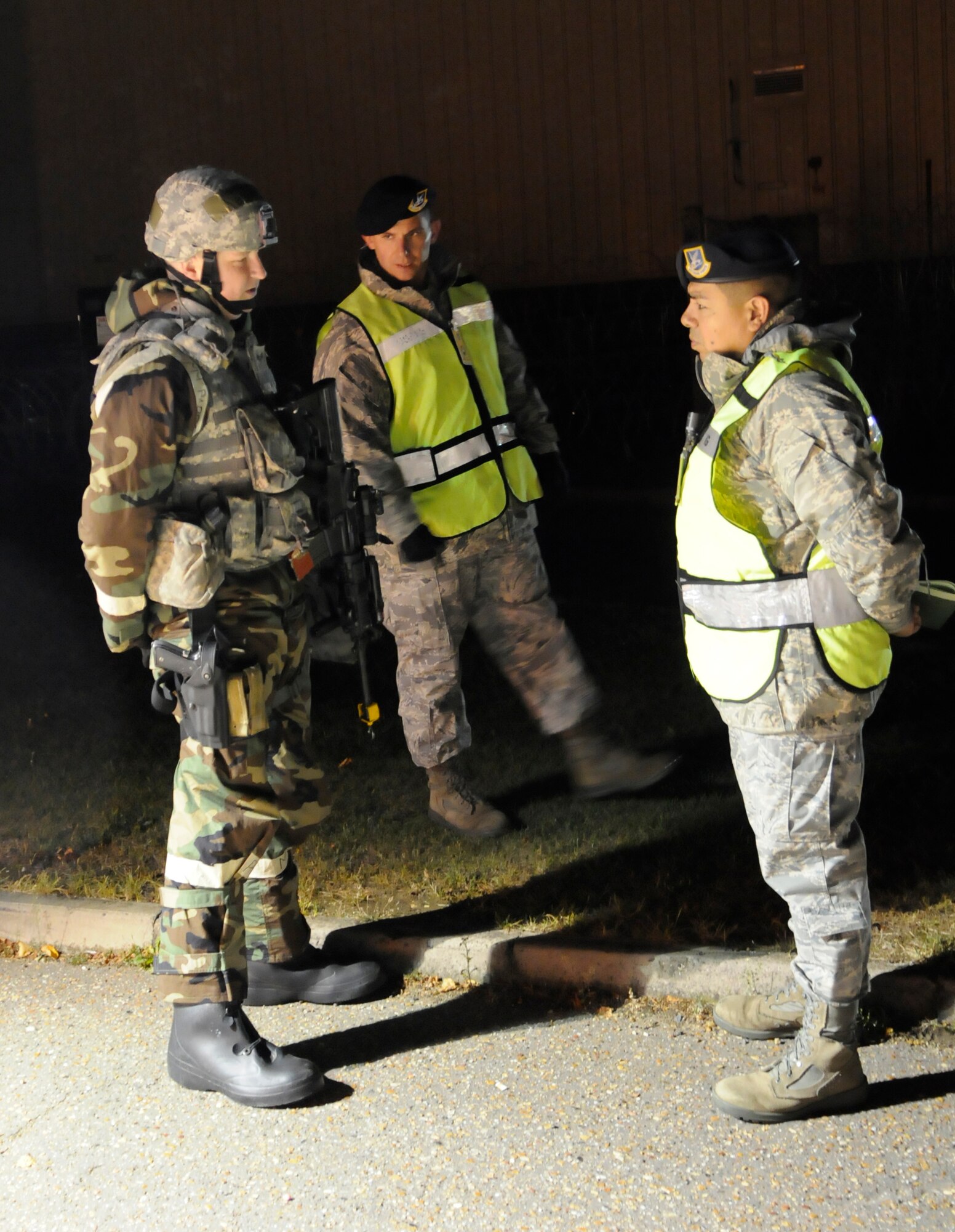 RAF MILDENHALL, England -- Senior Airman Brodie Beckett, 100th Security Forces Squadron, gets questioned by Inspector General team members during the Operational readiness Inspection Oct. 13.  Airmen participating in the exercise are required to perform their duties in wartime scenarios.  (U.S. Air Force photo/Staff Sgt. Christopher L. Ingersoll)