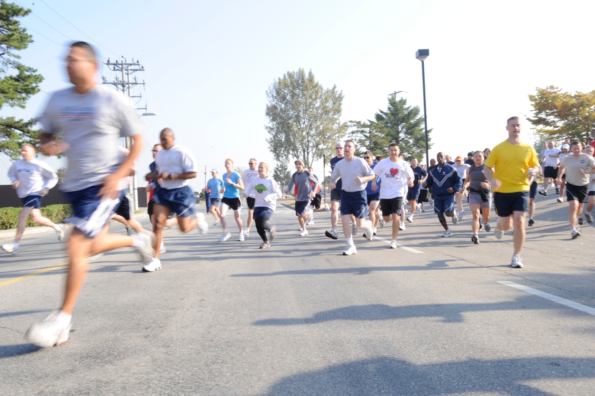 Airmen and their families participate in the Combined Federal Campaign 5-K run at Osan Air Base, Republic of Korea, Oct. 10.  The CFC began Oct. 5 and runs through Dec. 4. The mission of the CFC is to promote and support philanthropy through a program that is employee focused, cost-efficient and effective in providing all federal employees the opportunity to improve the quality of life for all. (U.S. Air Force photo/Senior Airman Stephenie Wade)

