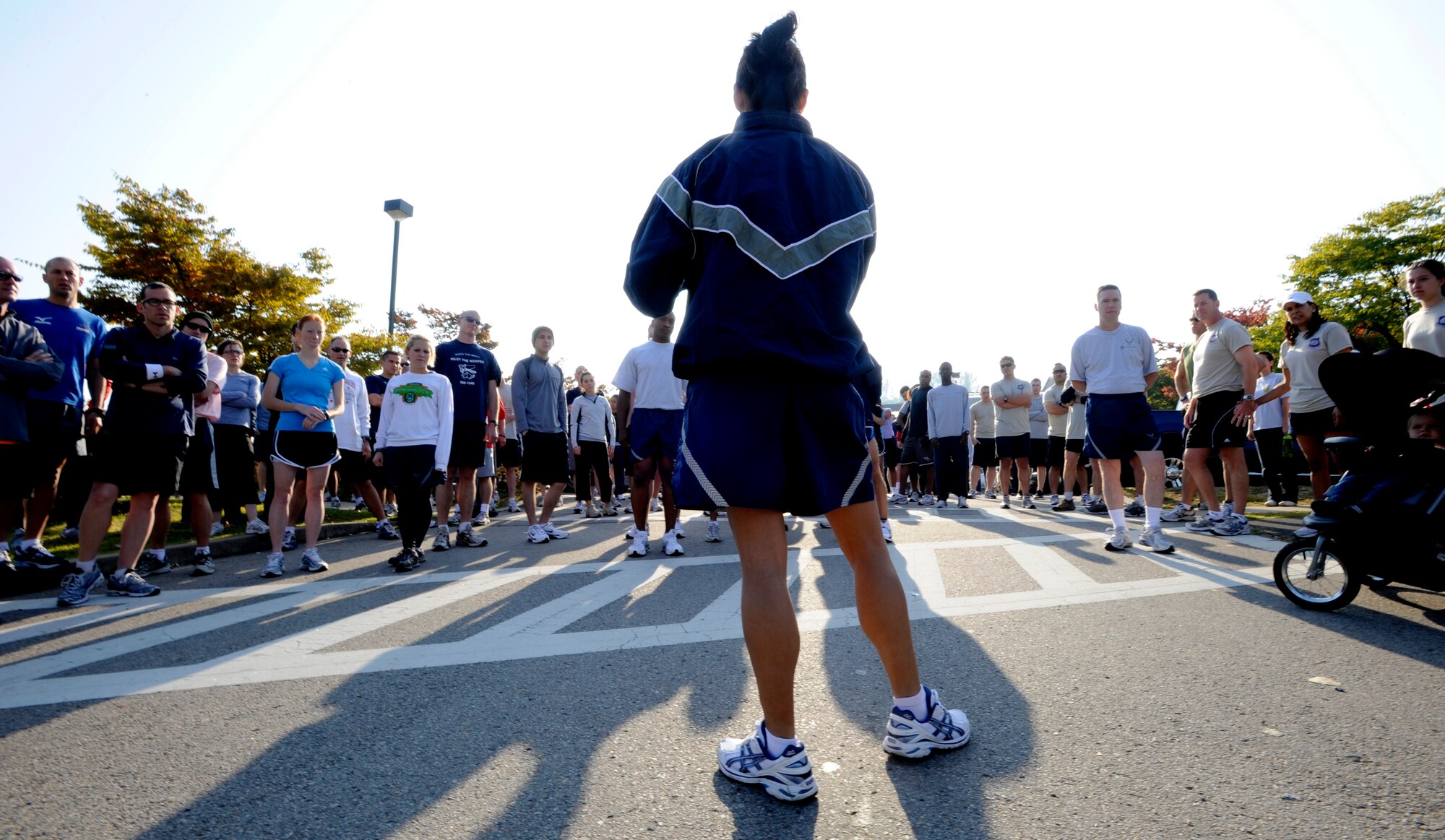 Capt. Martha Maldonado explains the rules before the Combined Federal Campaign 5-K run at Osan Air Base, Republic of Korea, Oct. 10.  The CFC began Oct. 5 and runs through Dec. 4. The mission of the CFC is to promote and support philanthropy through a program that is employee focused, cost-efficient and effective in providing all federal employees the opportunity to improve the quality of life for all. (U.S. Air Force photo/Senior Airman Stephenie Wade)

